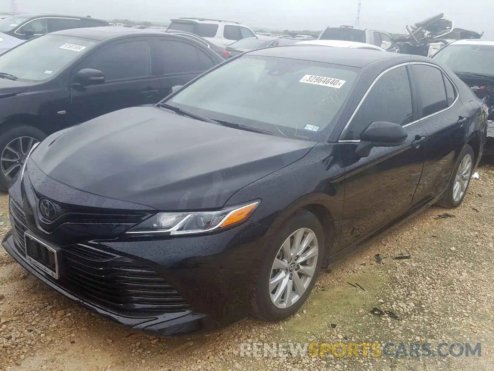 2 Photograph of a damaged car 4T1B11HK0KU829241 TOYOTA CAMRY 2019