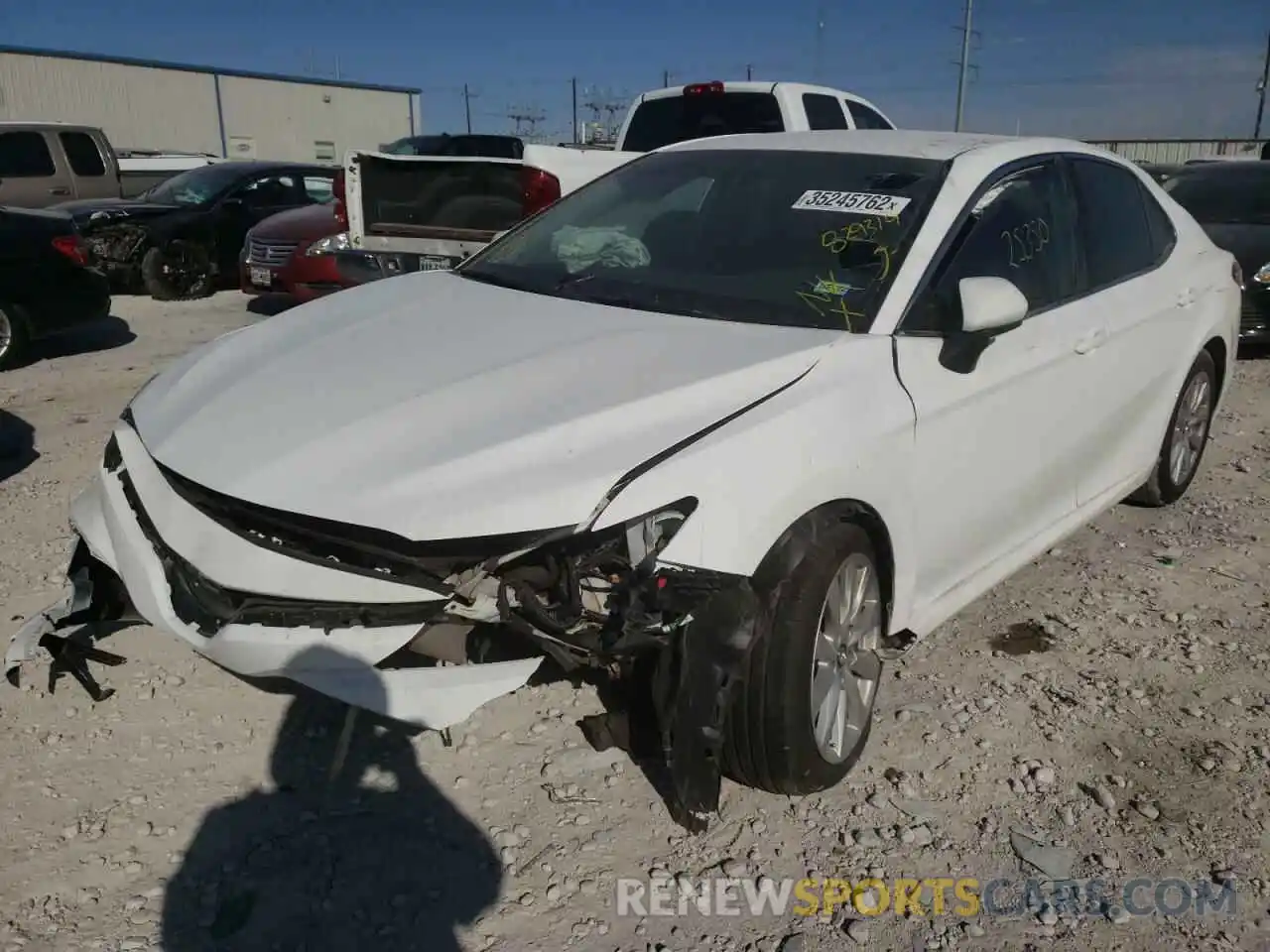 2 Photograph of a damaged car 4T1B11HK0KU829319 TOYOTA CAMRY 2019