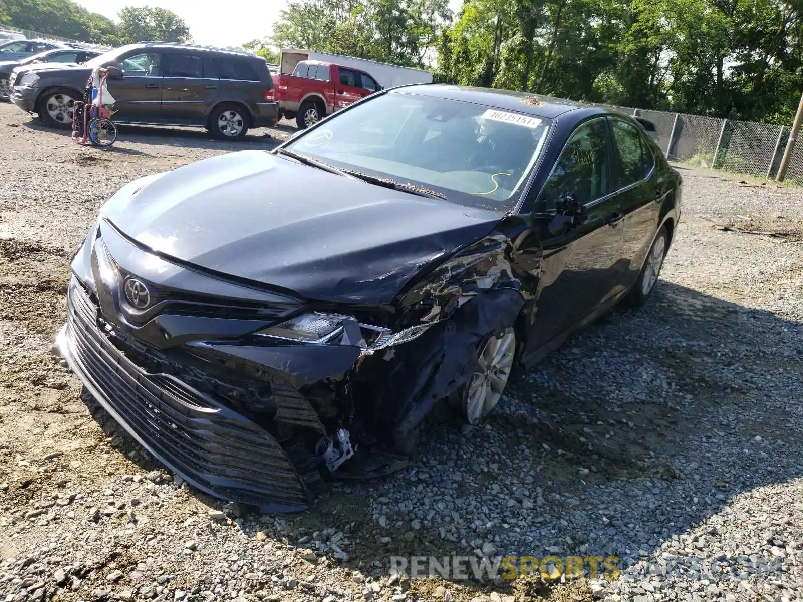 2 Photograph of a damaged car 4T1B11HK0KU829983 TOYOTA CAMRY 2019