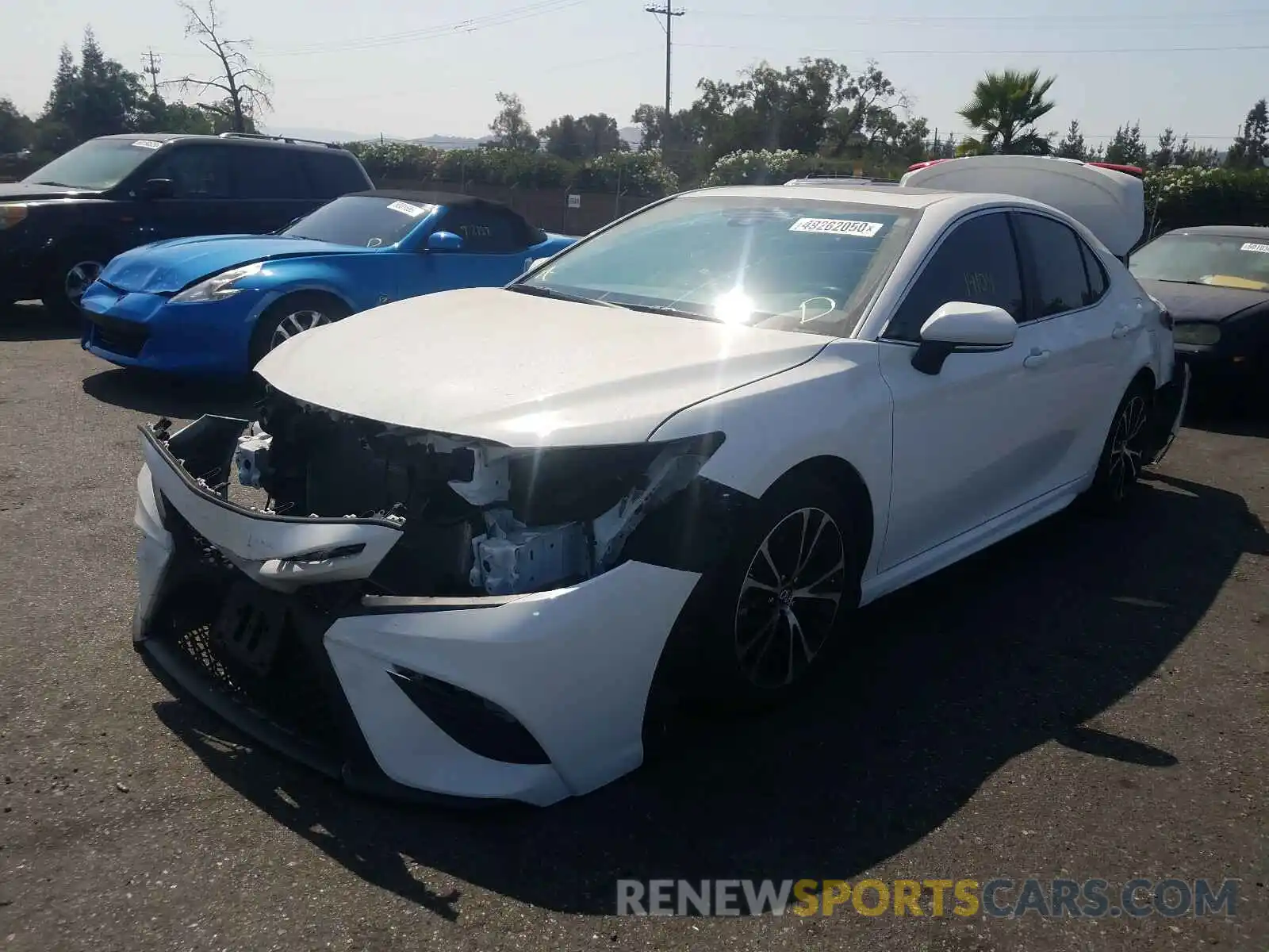 2 Photograph of a damaged car 4T1B11HK0KU832625 TOYOTA CAMRY 2019