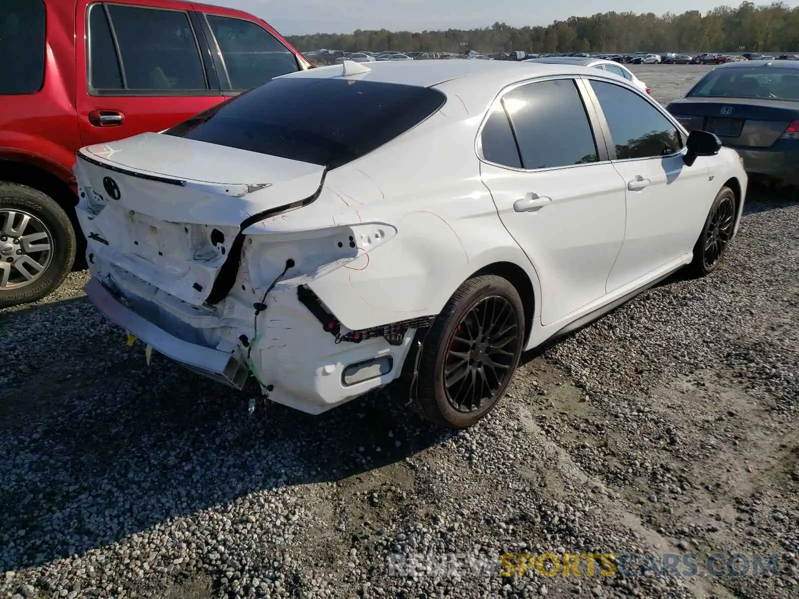 4 Photograph of a damaged car 4T1B11HK0KU834746 TOYOTA CAMRY 2019