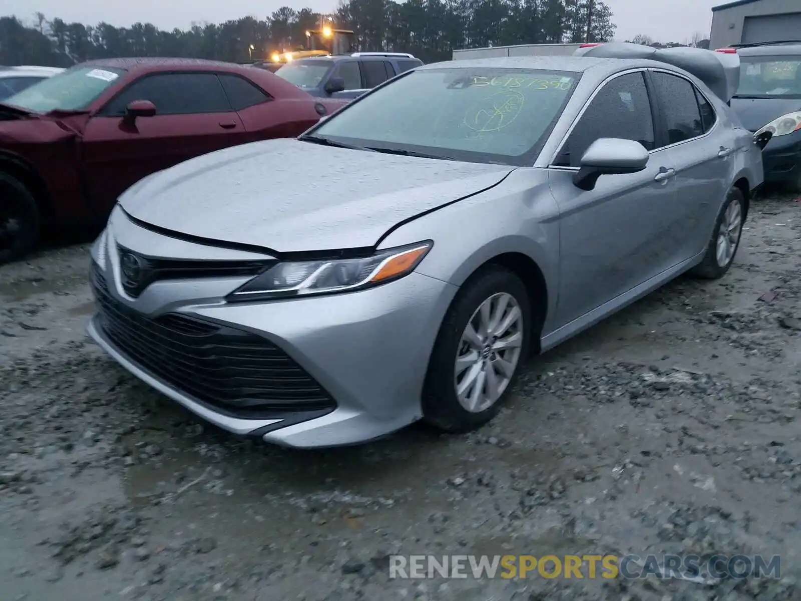 2 Photograph of a damaged car 4T1B11HK0KU835735 TOYOTA CAMRY 2019