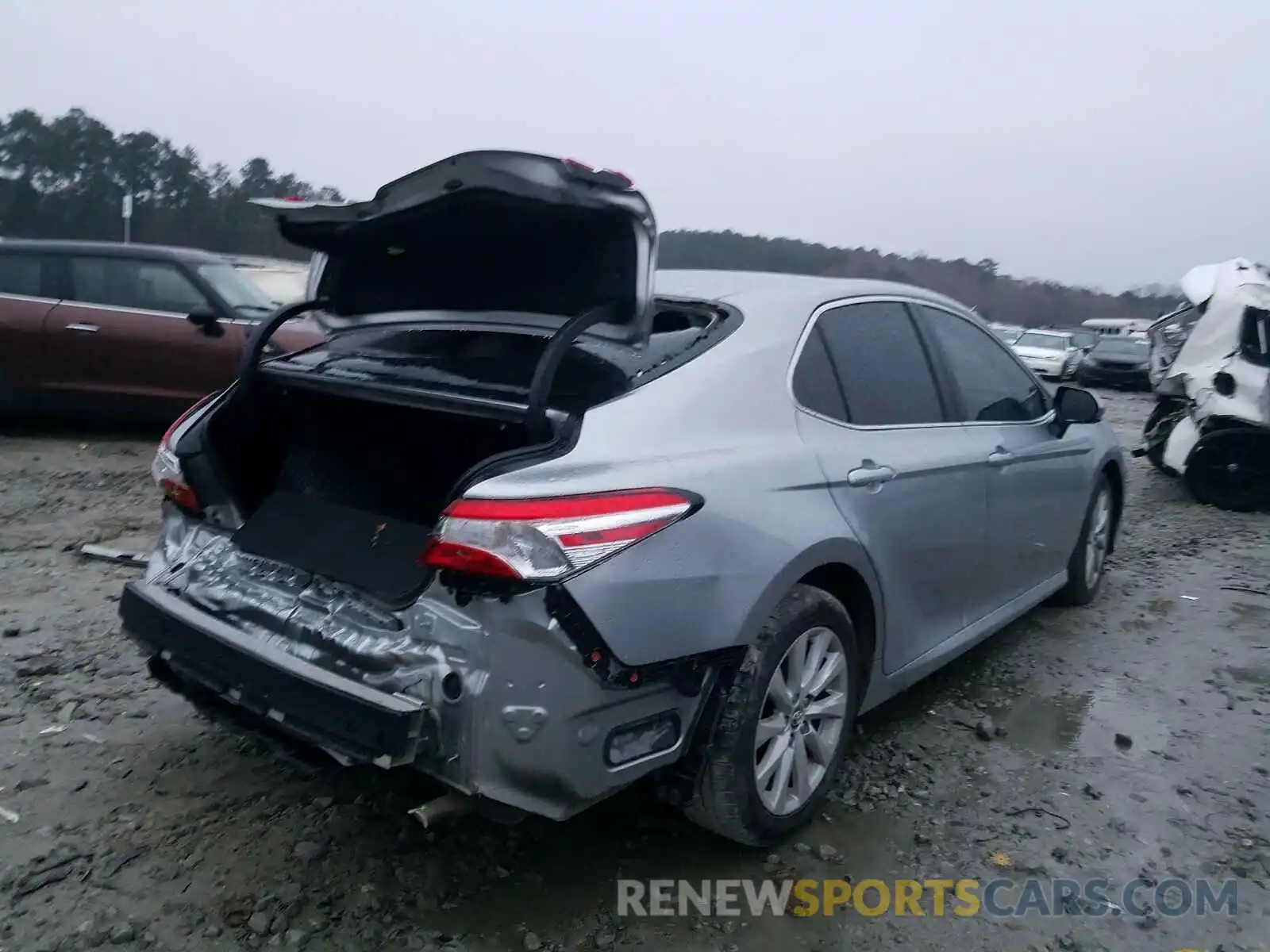 4 Photograph of a damaged car 4T1B11HK0KU835735 TOYOTA CAMRY 2019