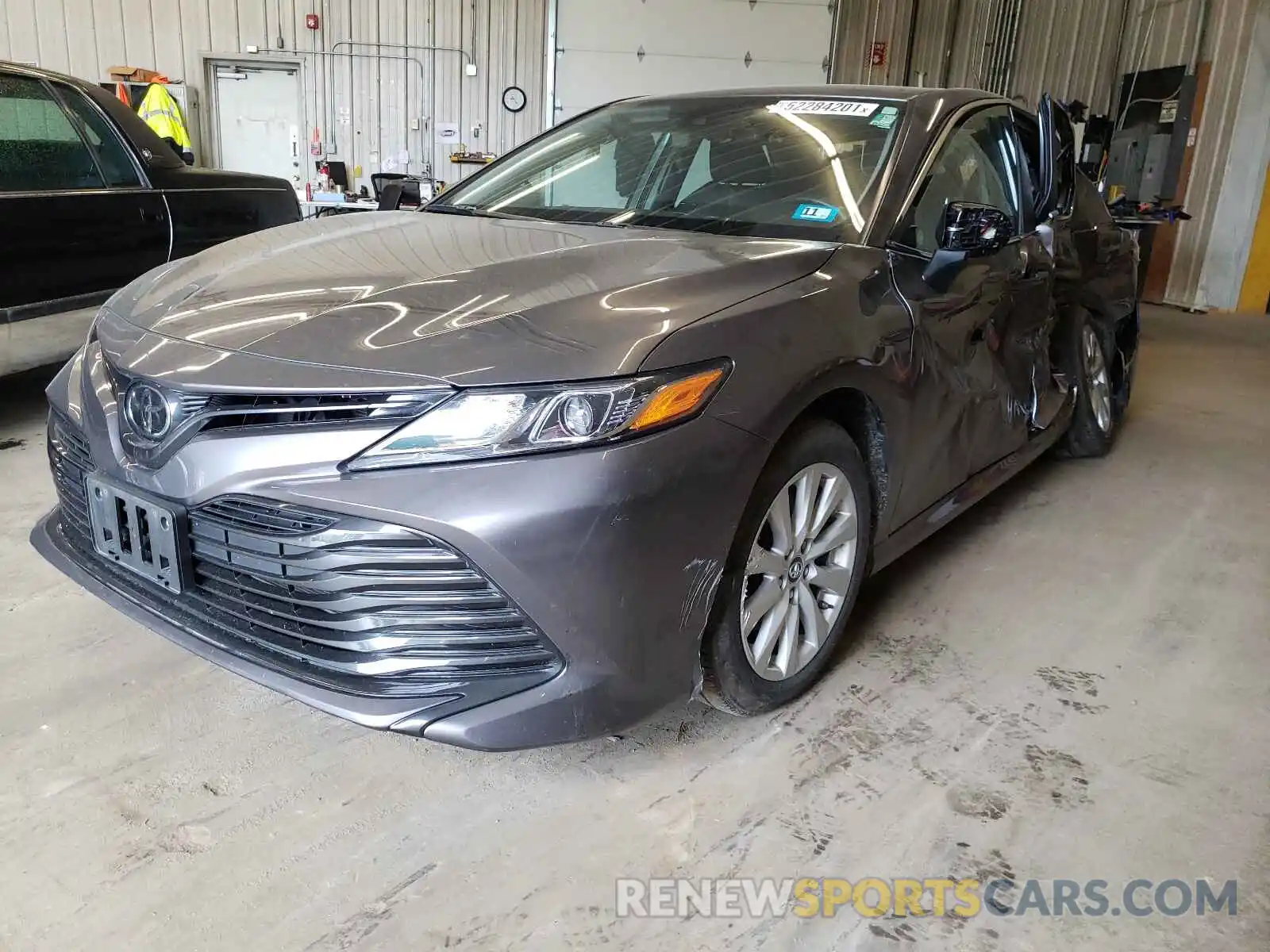 2 Photograph of a damaged car 4T1B11HK0KU841681 TOYOTA CAMRY 2019