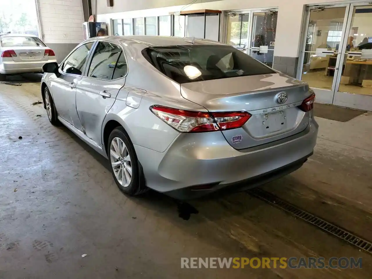 3 Photograph of a damaged car 4T1B11HK0KU842040 TOYOTA CAMRY 2019