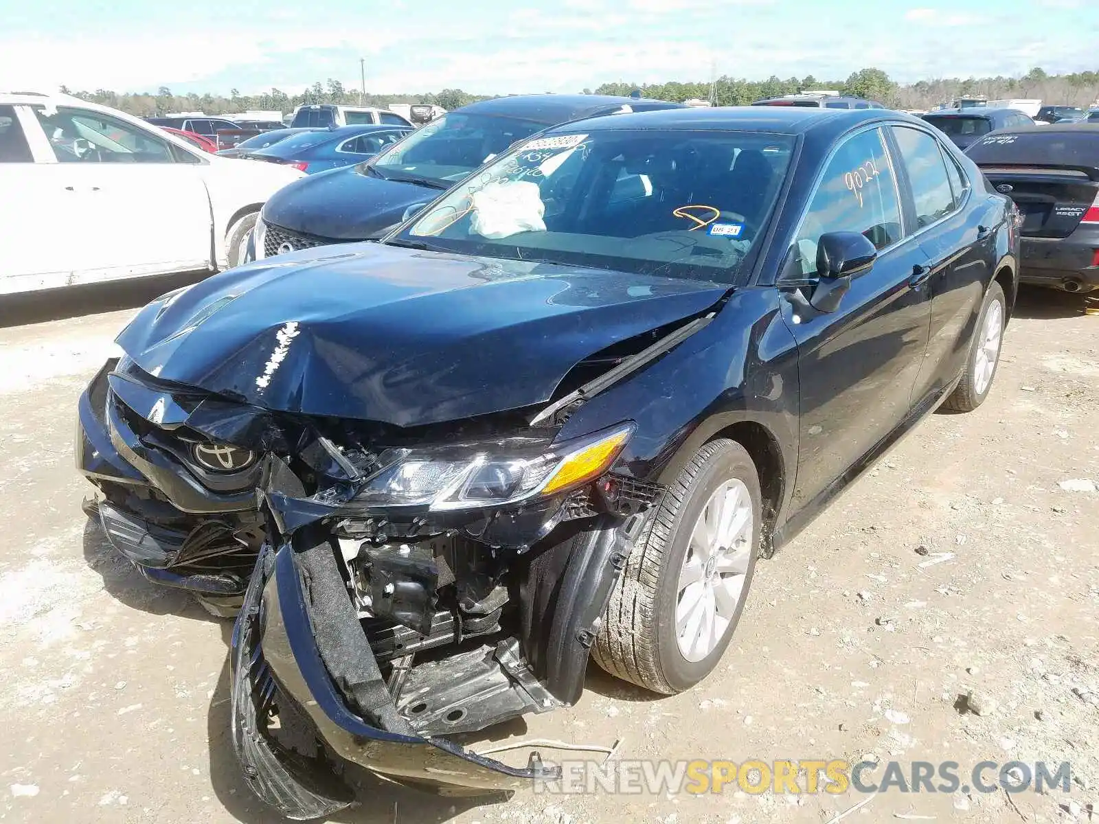 2 Photograph of a damaged car 4T1B11HK0KU844208 TOYOTA CAMRY 2019