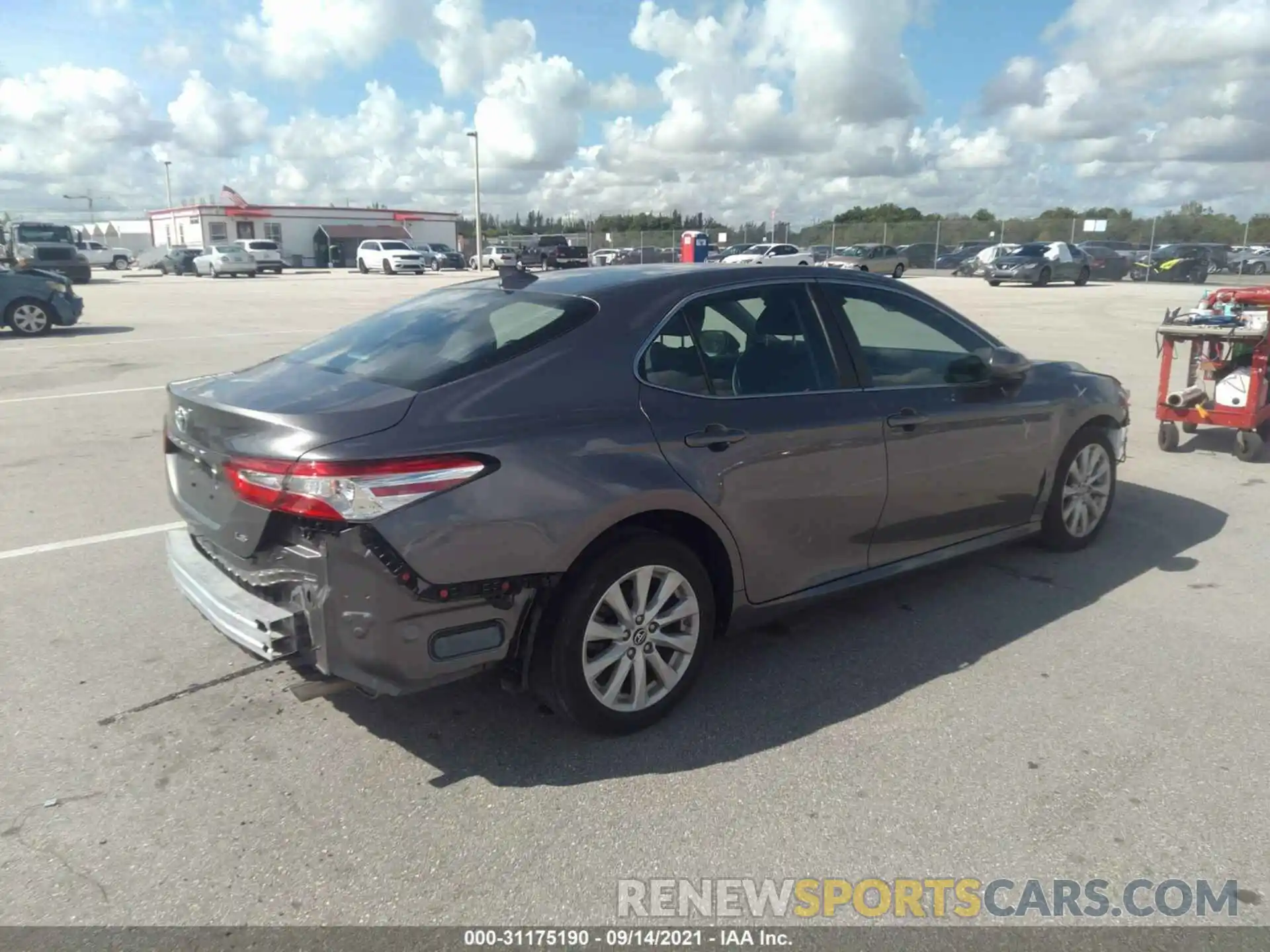 4 Photograph of a damaged car 4T1B11HK0KU847173 TOYOTA CAMRY 2019