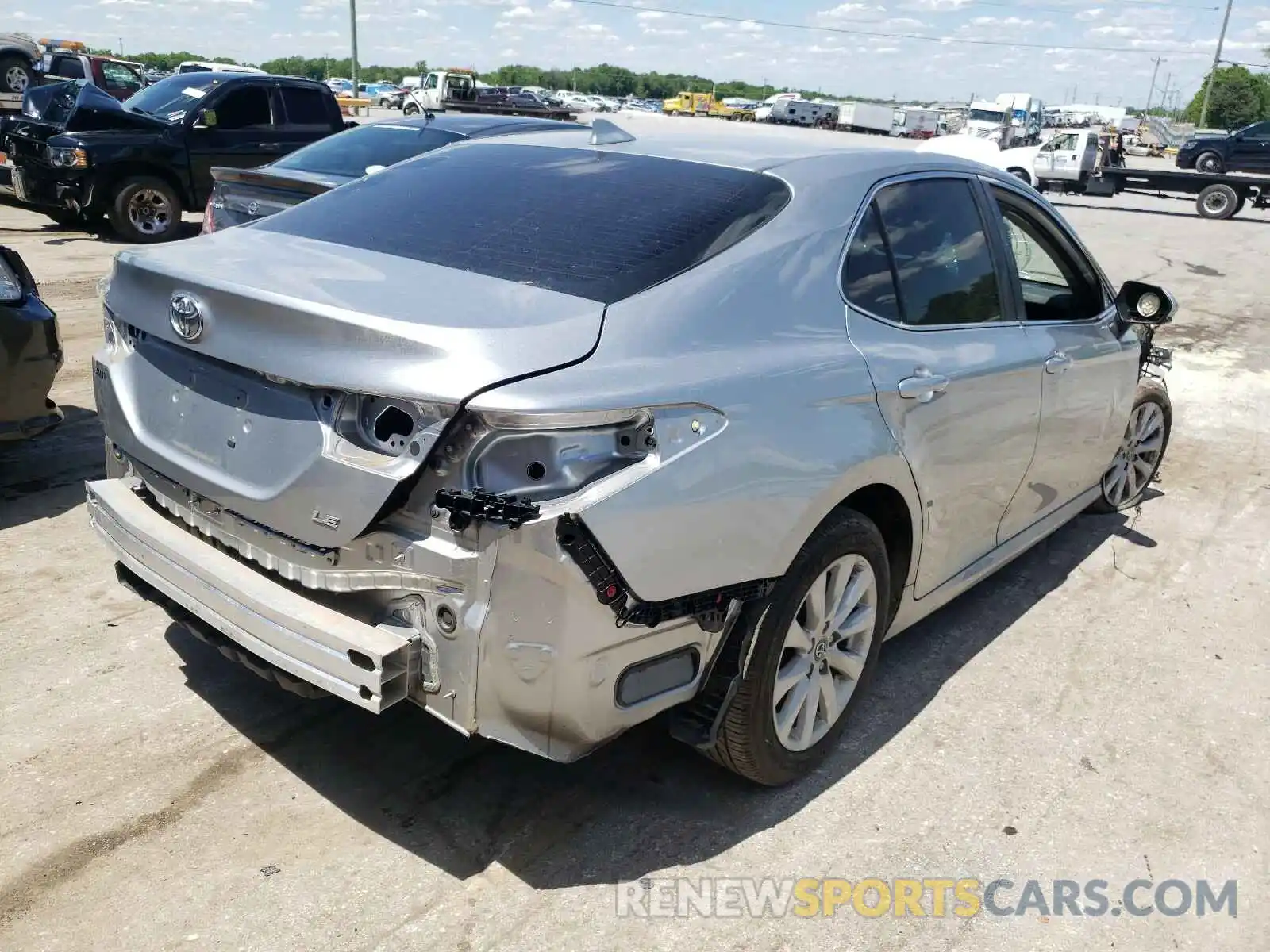 4 Photograph of a damaged car 4T1B11HK0KU848016 TOYOTA CAMRY 2019