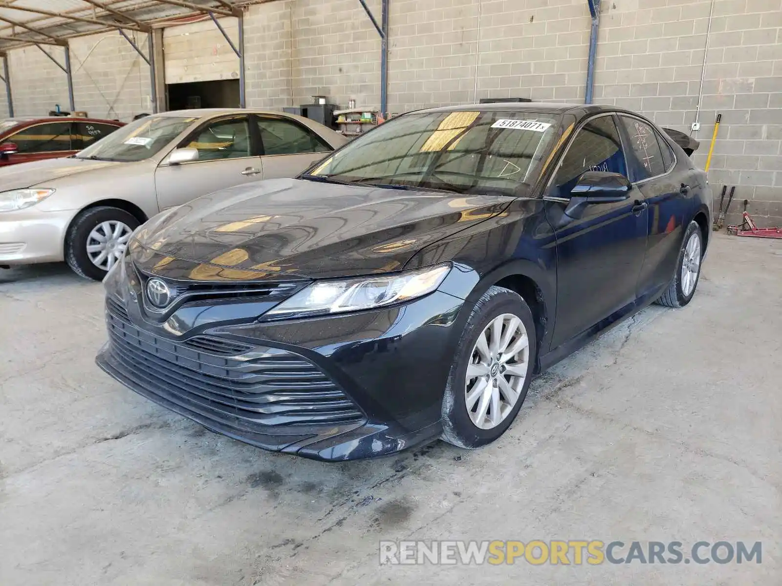 2 Photograph of a damaged car 4T1B11HK0KU852759 TOYOTA CAMRY 2019