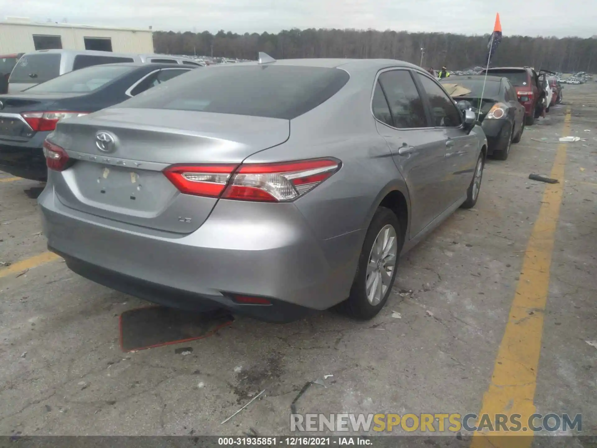 4 Photograph of a damaged car 4T1B11HK0KU852910 TOYOTA CAMRY 2019