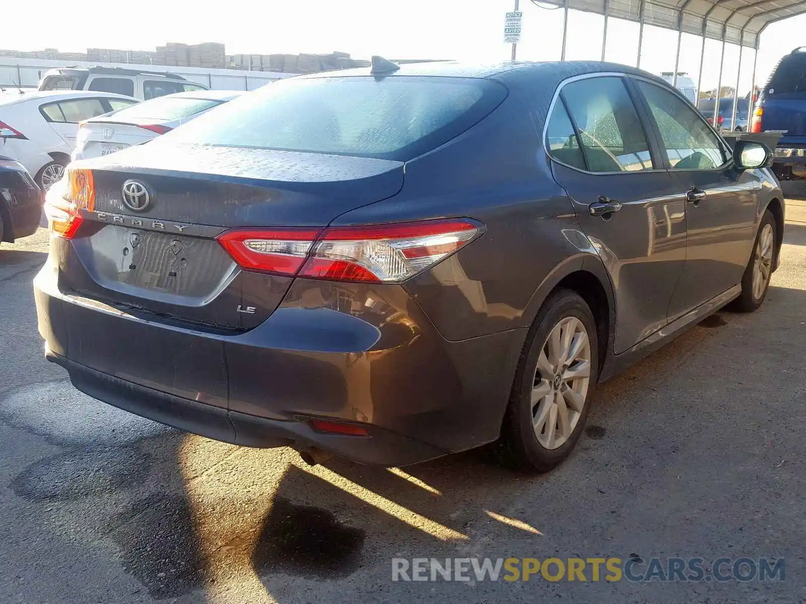 4 Photograph of a damaged car 4T1B11HK0KU855287 TOYOTA CAMRY 2019