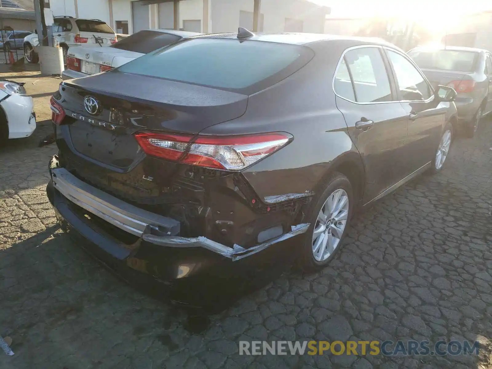 4 Photograph of a damaged car 4T1B11HK0KU856195 TOYOTA CAMRY 2019