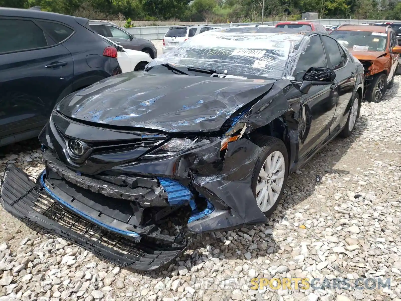 2 Photograph of a damaged car 4T1B11HK1KU163832 TOYOTA CAMRY 2019