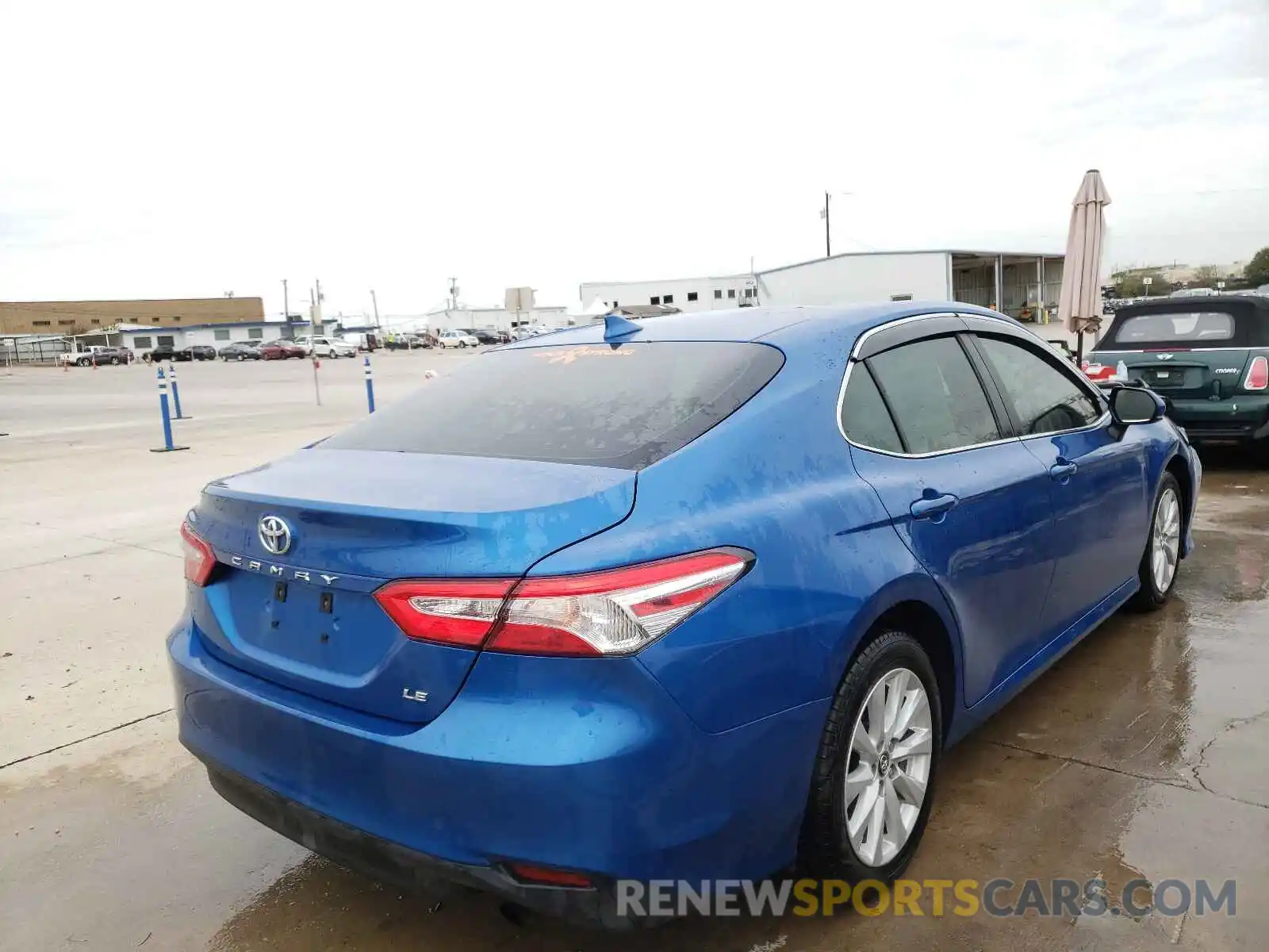 4 Photograph of a damaged car 4T1B11HK1KU164513 TOYOTA CAMRY 2019