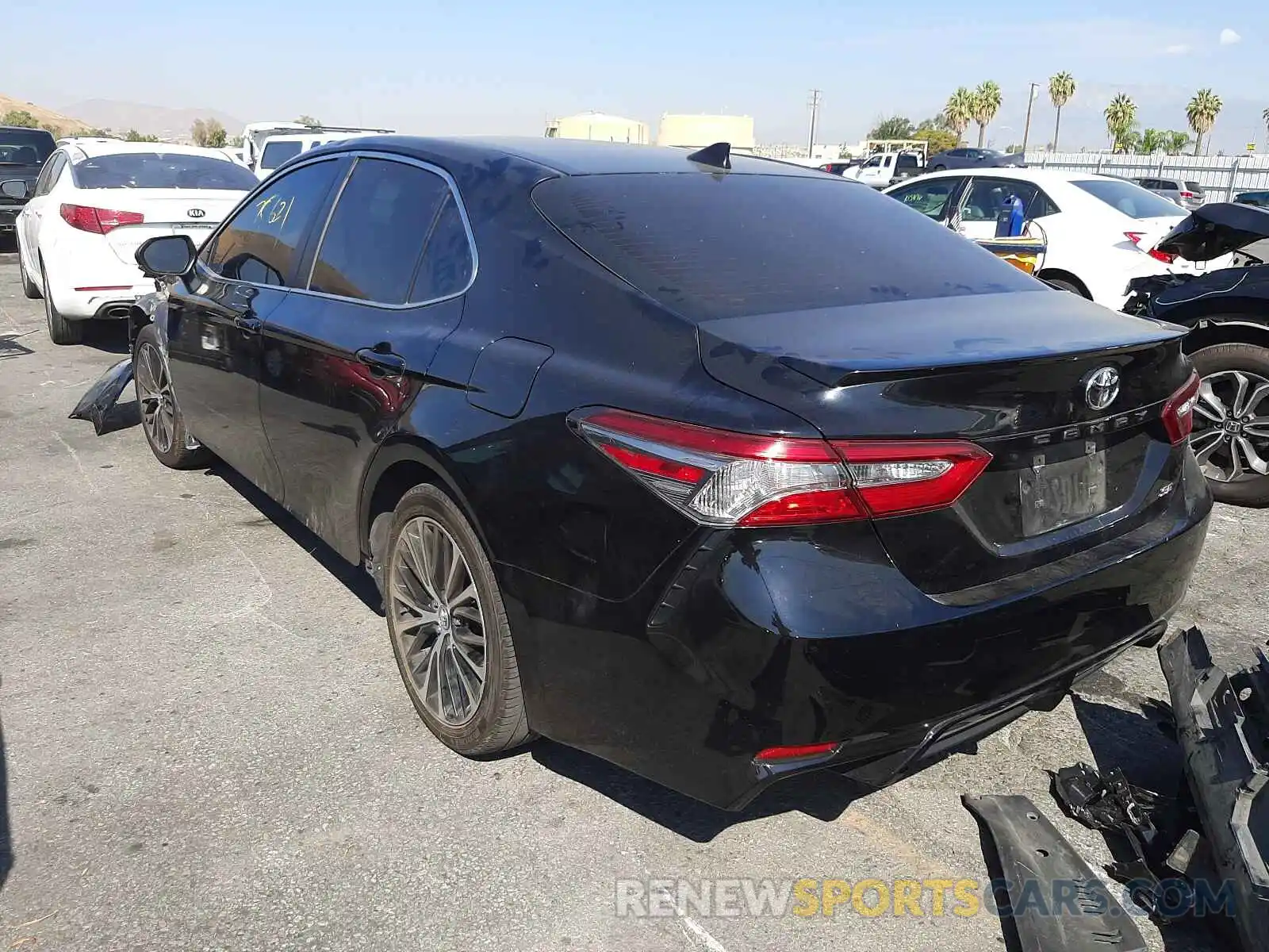 3 Photograph of a damaged car 4T1B11HK1KU165399 TOYOTA CAMRY 2019