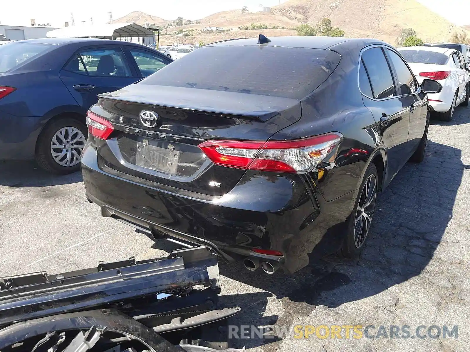 4 Photograph of a damaged car 4T1B11HK1KU165399 TOYOTA CAMRY 2019