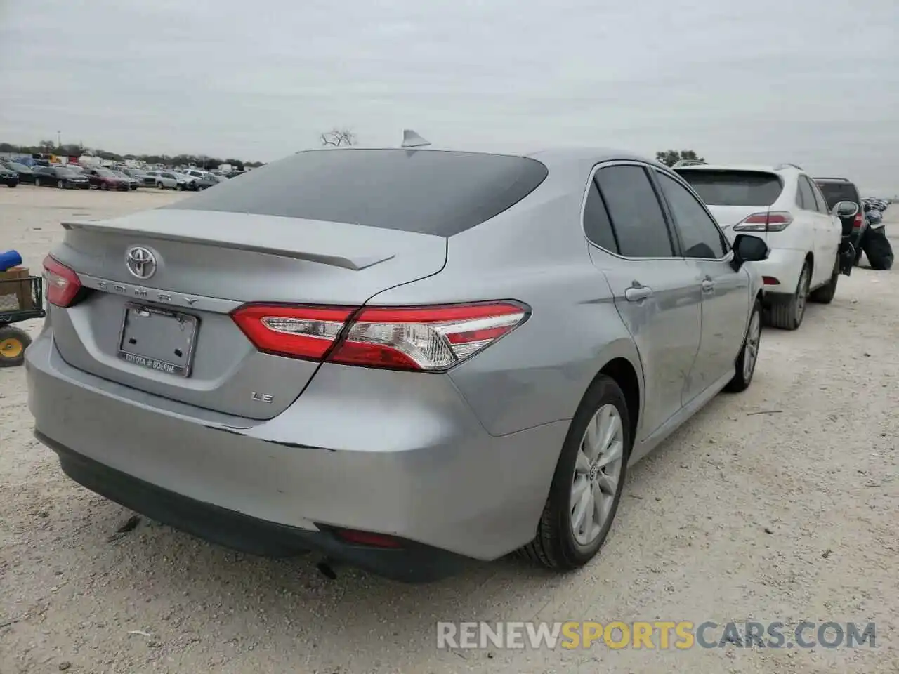 4 Photograph of a damaged car 4T1B11HK1KU166150 TOYOTA CAMRY 2019