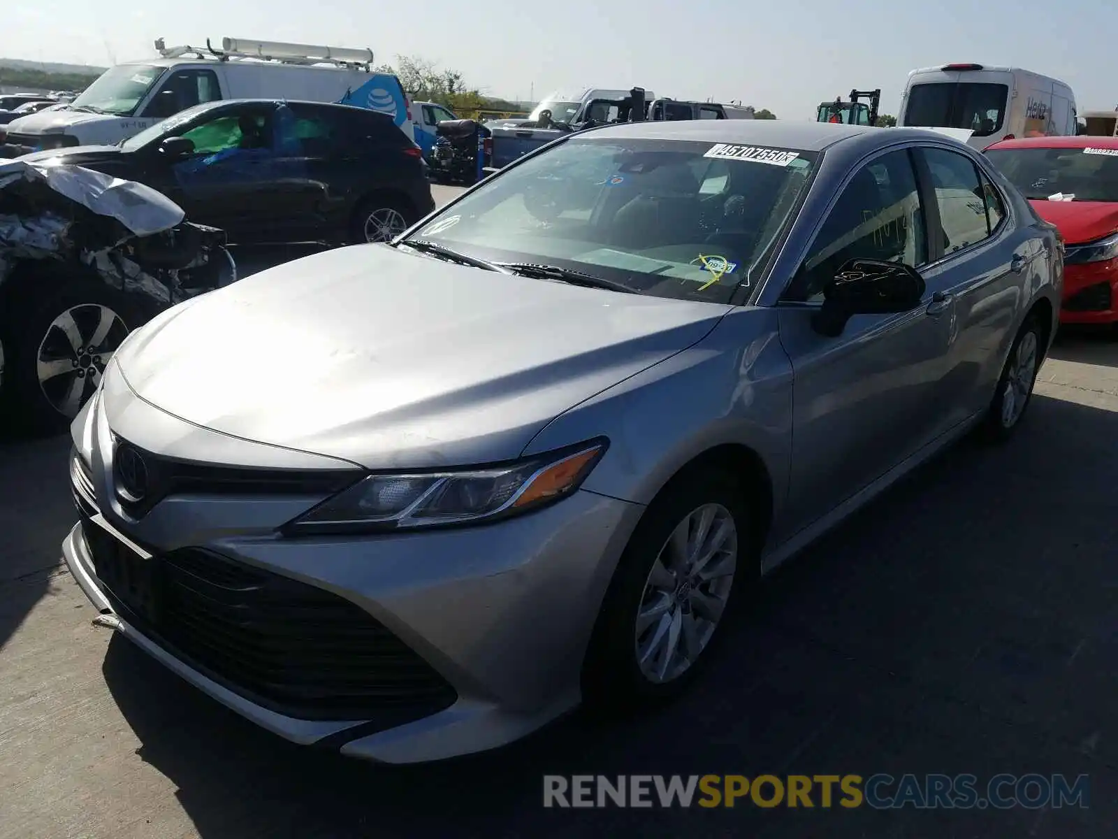 2 Photograph of a damaged car 4T1B11HK1KU166875 TOYOTA CAMRY 2019