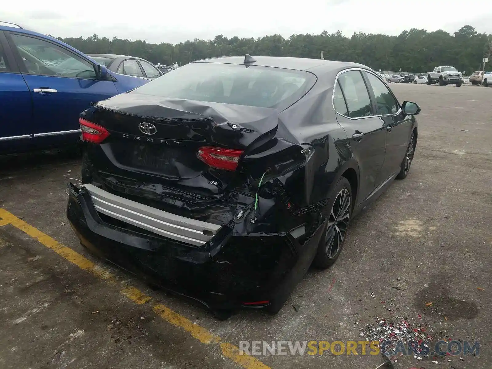 4 Photograph of a damaged car 4T1B11HK1KU167203 TOYOTA CAMRY 2019