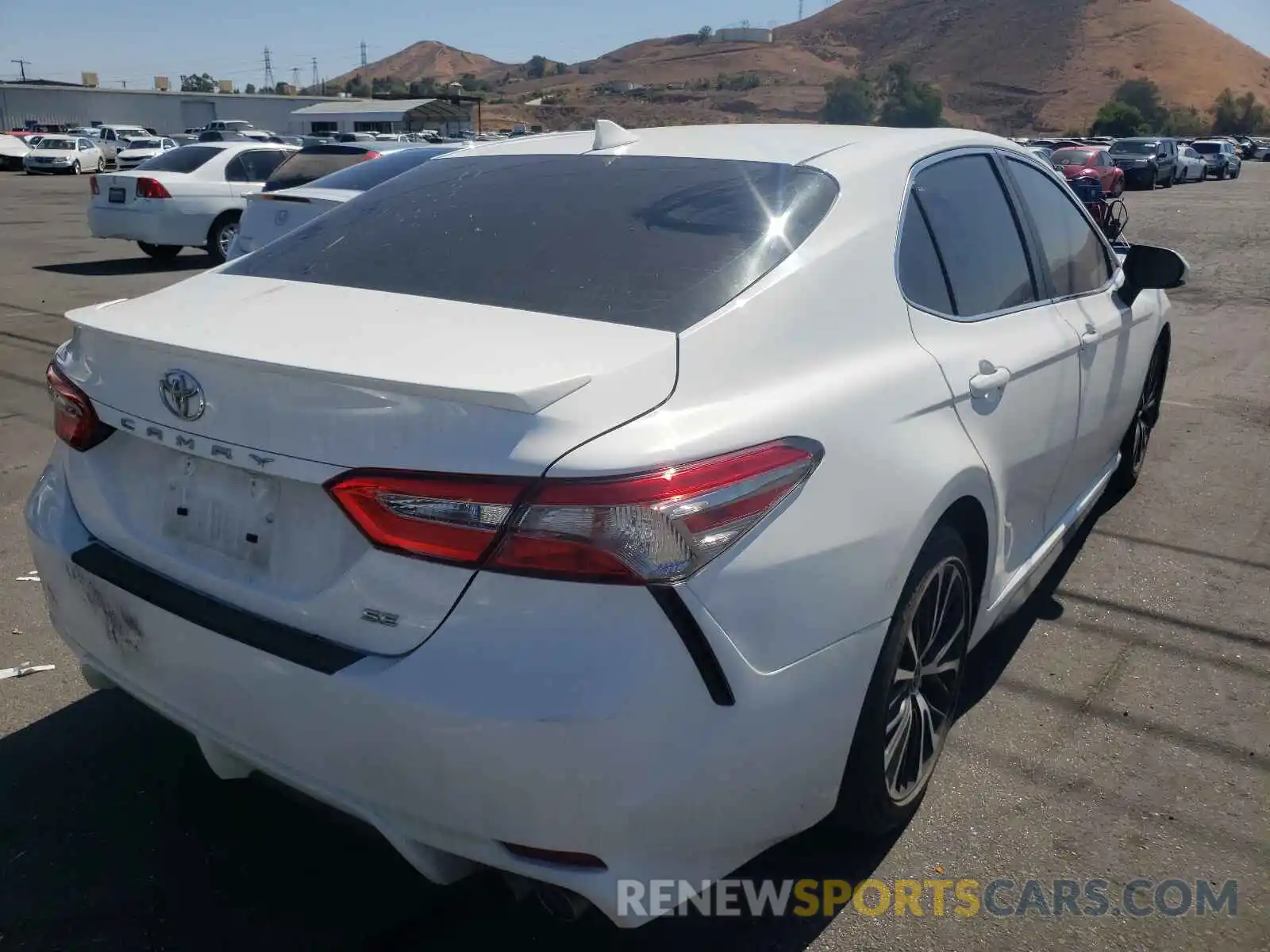 4 Photograph of a damaged car 4T1B11HK1KU167752 TOYOTA CAMRY 2019