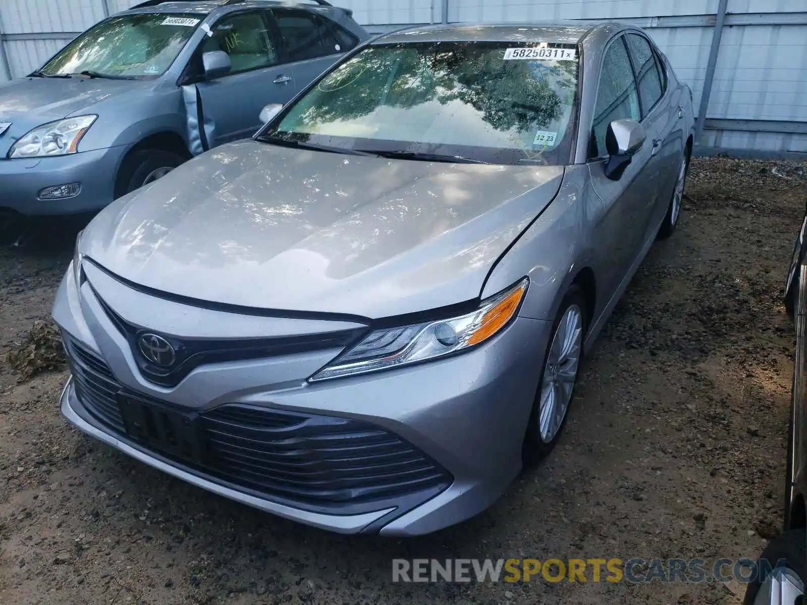 2 Photograph of a damaged car 4T1B11HK1KU169064 TOYOTA CAMRY 2019