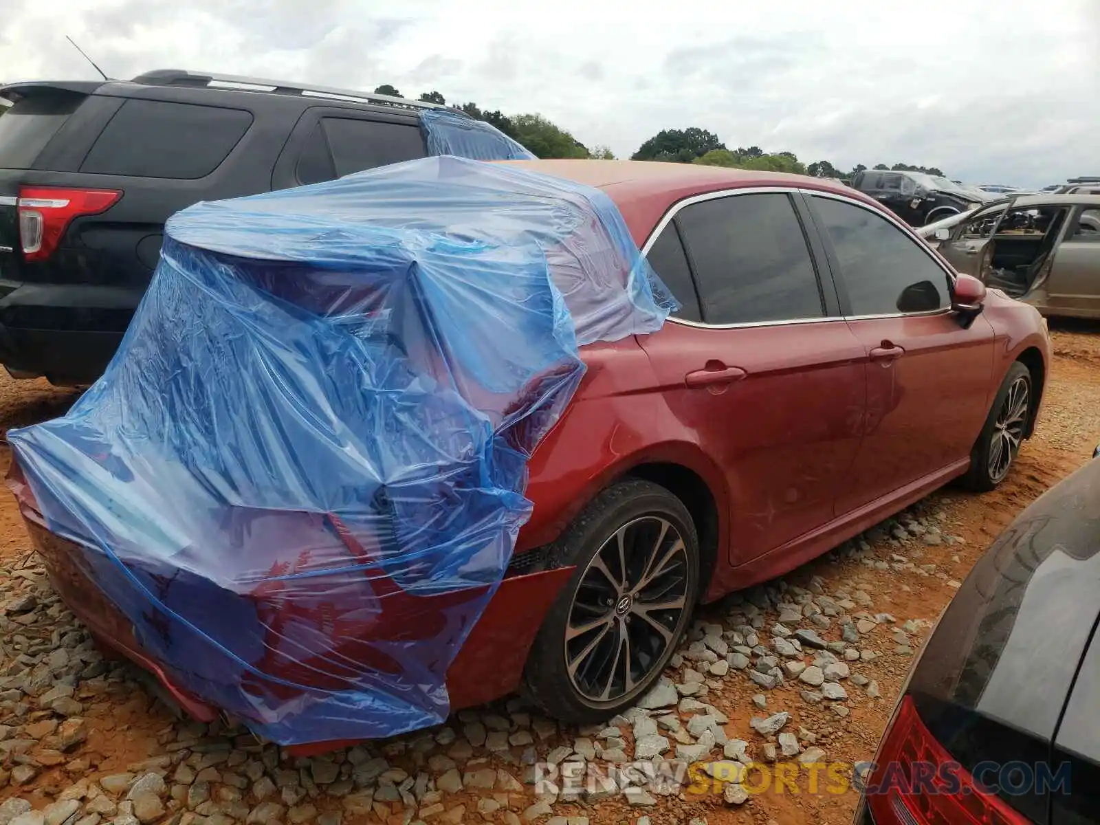 4 Photograph of a damaged car 4T1B11HK1KU174832 TOYOTA CAMRY 2019