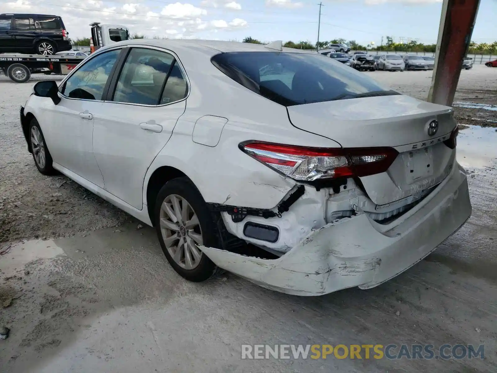 3 Photograph of a damaged car 4T1B11HK1KU175060 TOYOTA CAMRY 2019