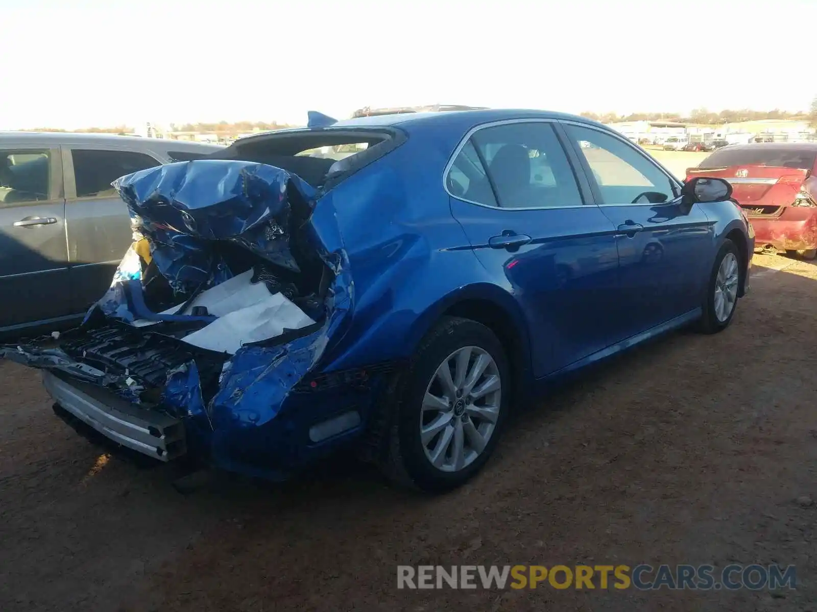 4 Photograph of a damaged car 4T1B11HK1KU175589 TOYOTA CAMRY 2019