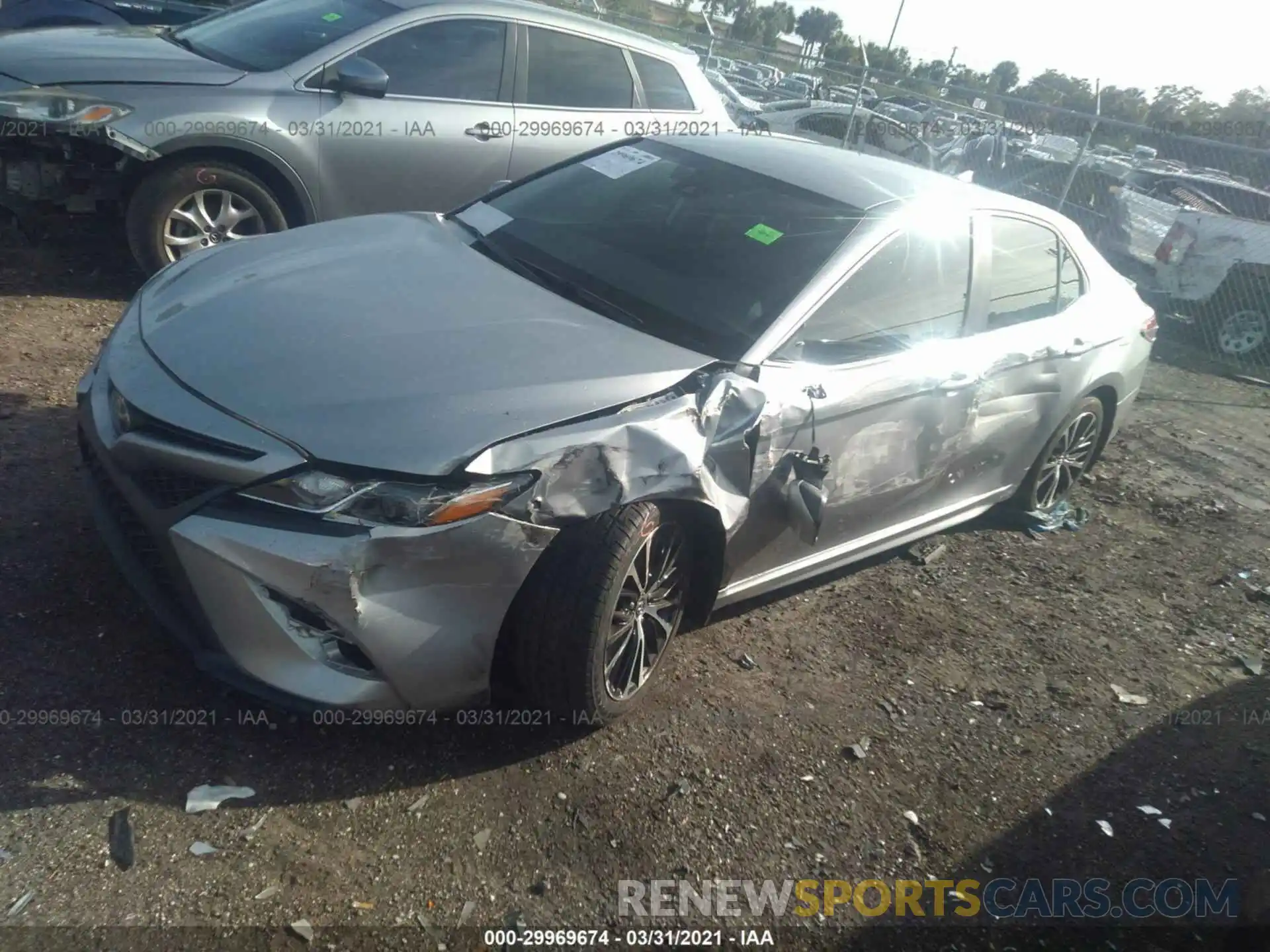 2 Photograph of a damaged car 4T1B11HK1KU177102 TOYOTA CAMRY 2019