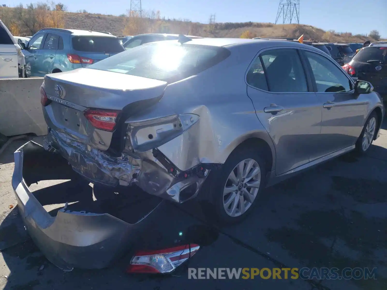 4 Photograph of a damaged car 4T1B11HK1KU192053 TOYOTA CAMRY 2019