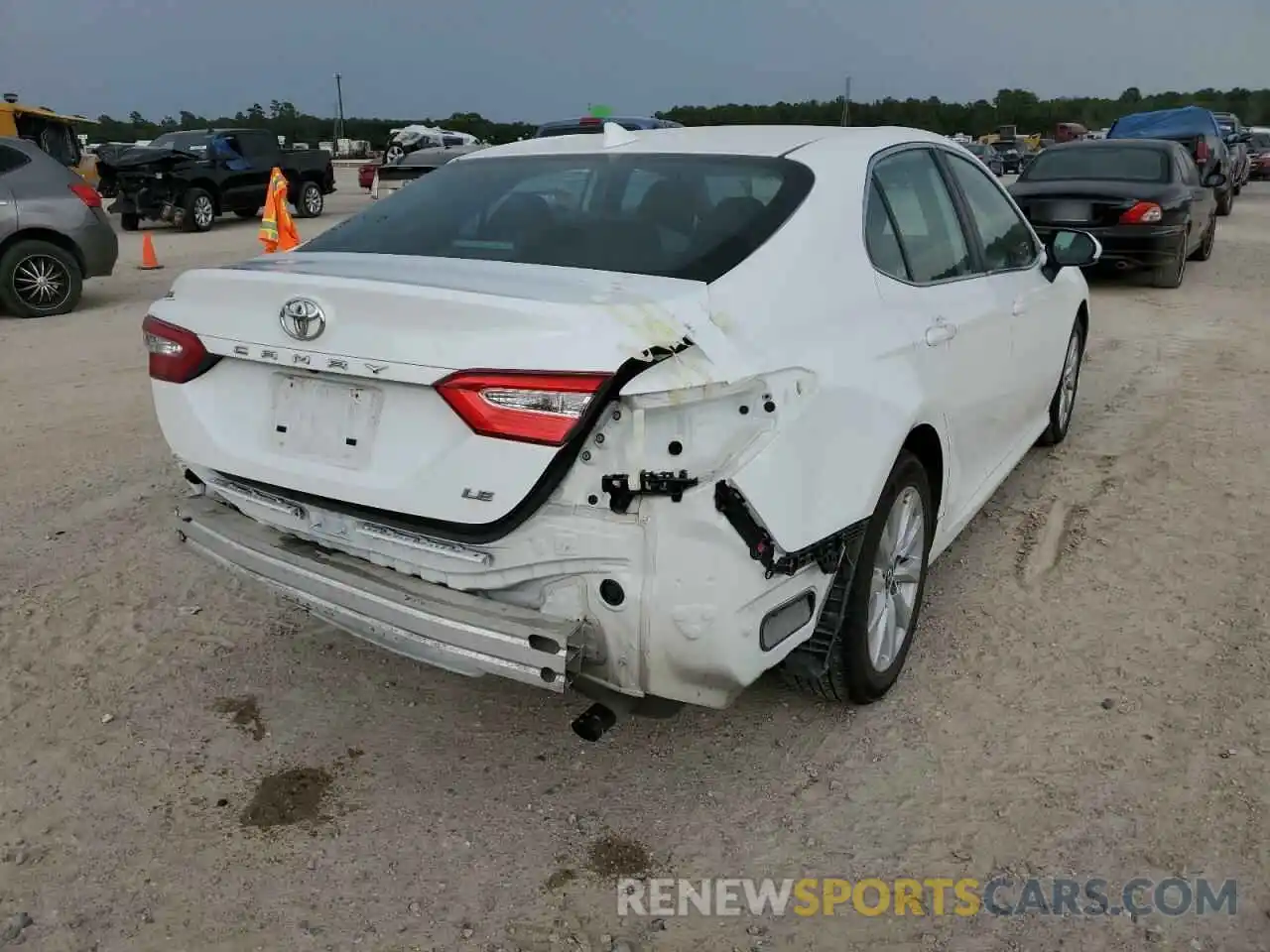 4 Photograph of a damaged car 4T1B11HK1KU196880 TOYOTA CAMRY 2019