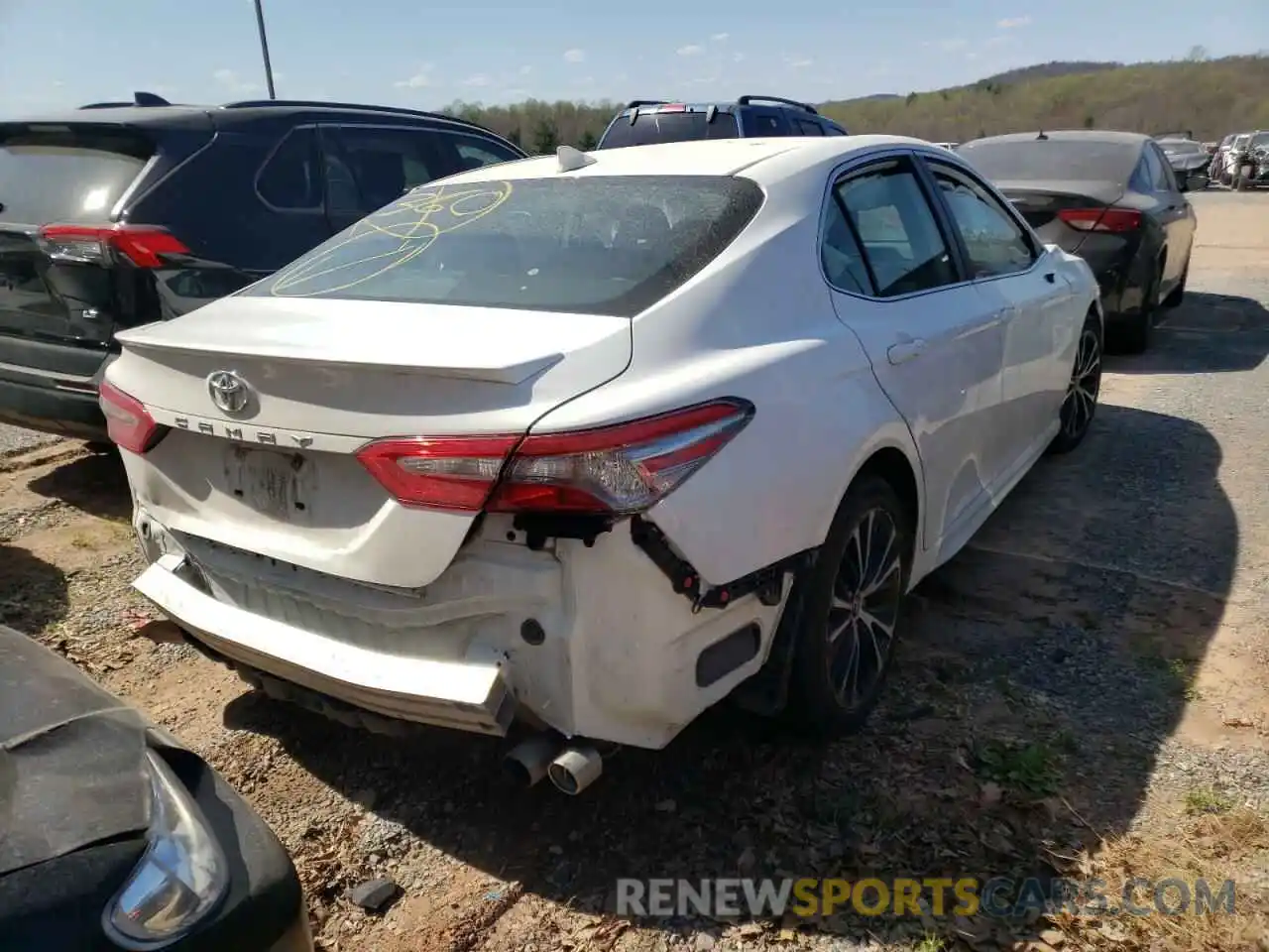 4 Photograph of a damaged car 4T1B11HK1KU198273 TOYOTA CAMRY 2019