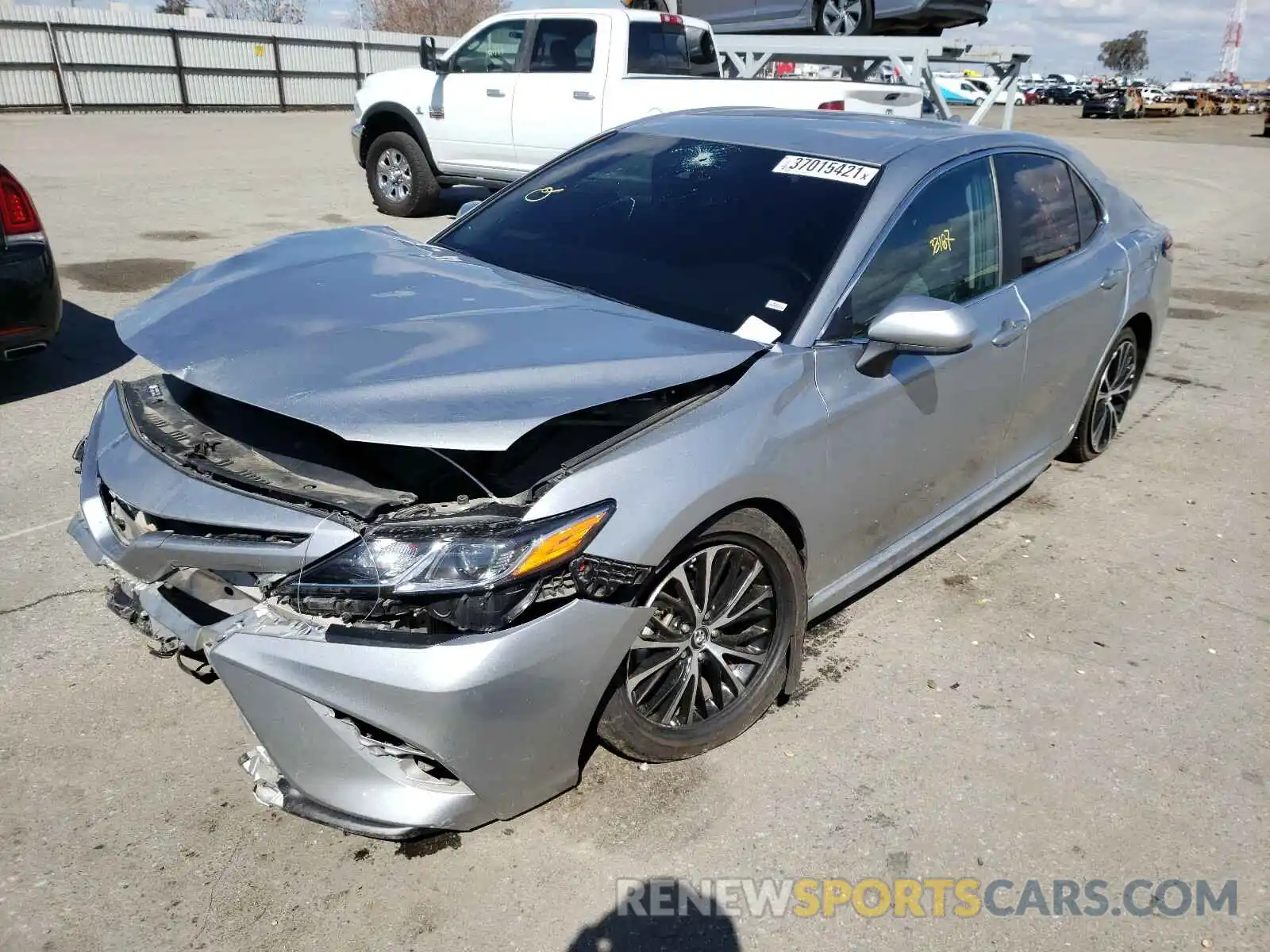 2 Photograph of a damaged car 4T1B11HK1KU199309 TOYOTA CAMRY 2019