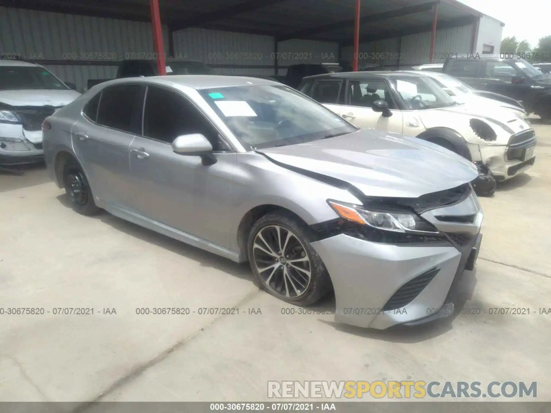 1 Photograph of a damaged car 4T1B11HK1KU199584 TOYOTA CAMRY 2019