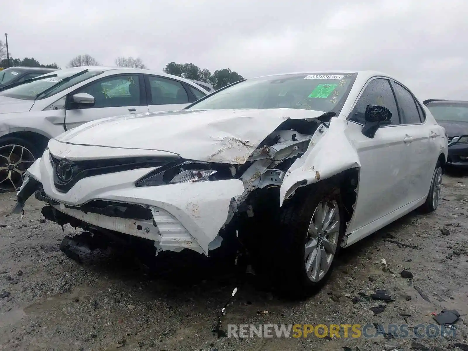 2 Photograph of a damaged car 4T1B11HK1KU201561 TOYOTA CAMRY 2019
