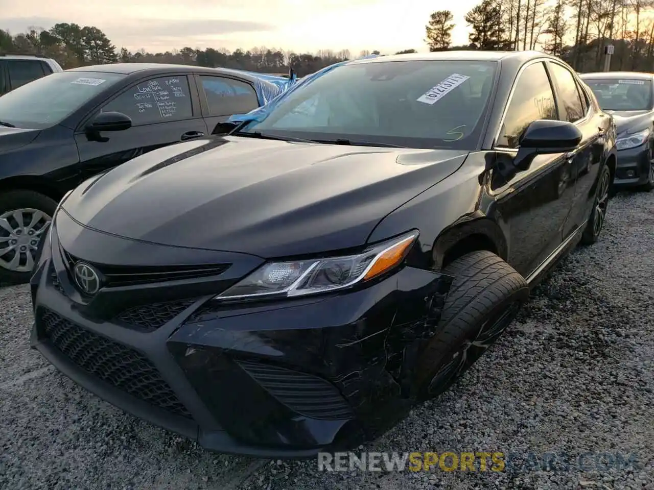 2 Photograph of a damaged car 4T1B11HK1KU203049 TOYOTA CAMRY 2019