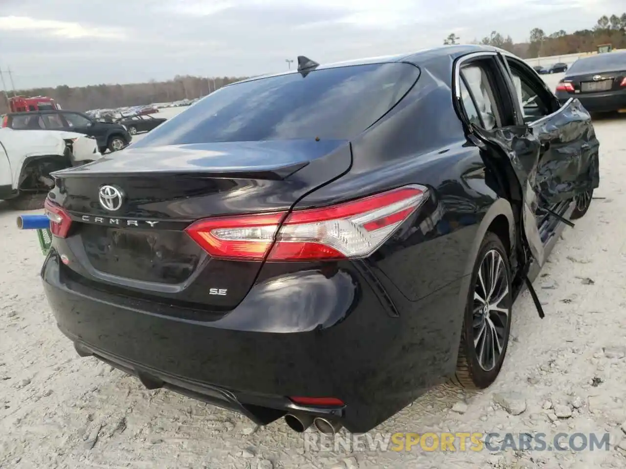 4 Photograph of a damaged car 4T1B11HK1KU203049 TOYOTA CAMRY 2019