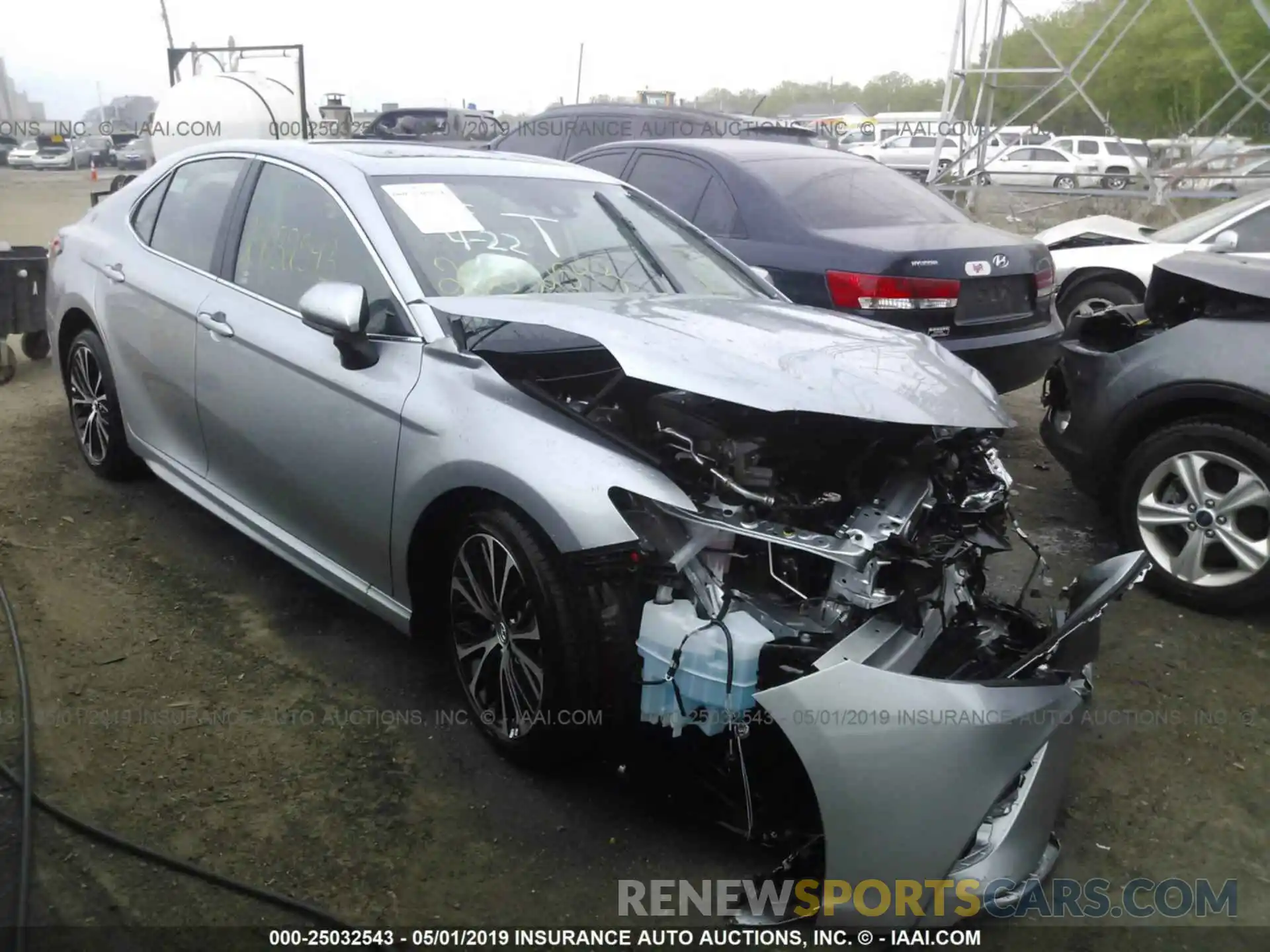 1 Photograph of a damaged car 4T1B11HK1KU203813 TOYOTA CAMRY 2019