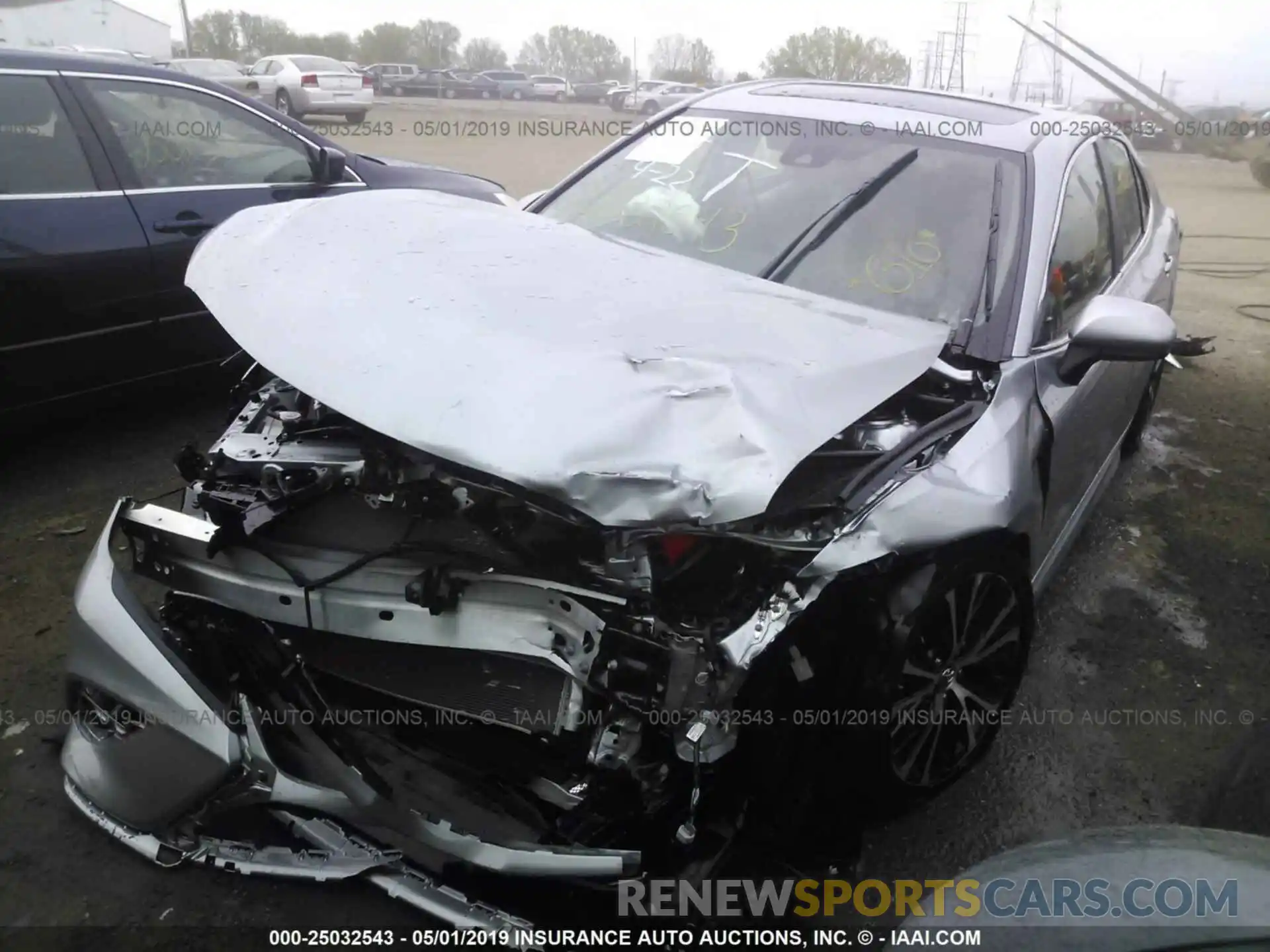 2 Photograph of a damaged car 4T1B11HK1KU203813 TOYOTA CAMRY 2019