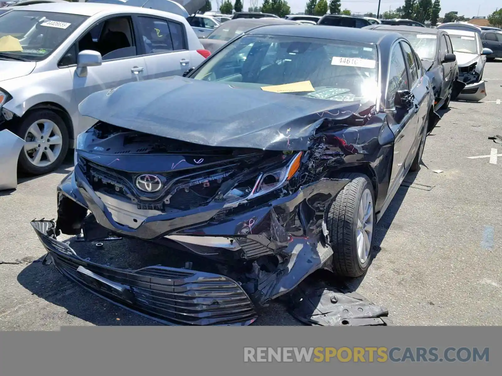 2 Photograph of a damaged car 4T1B11HK1KU204914 TOYOTA CAMRY 2019