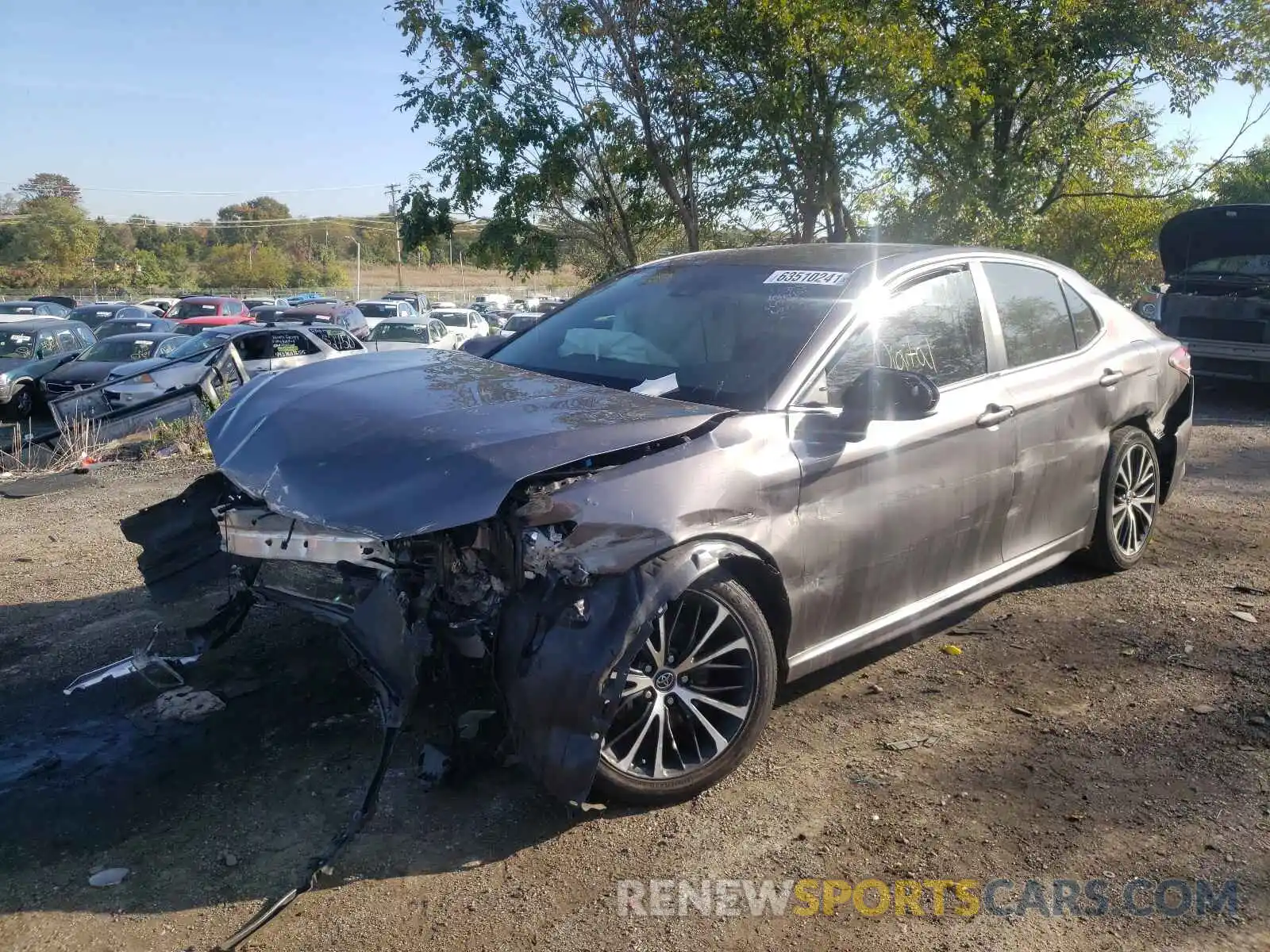 2 Photograph of a damaged car 4T1B11HK1KU206713 TOYOTA CAMRY 2019