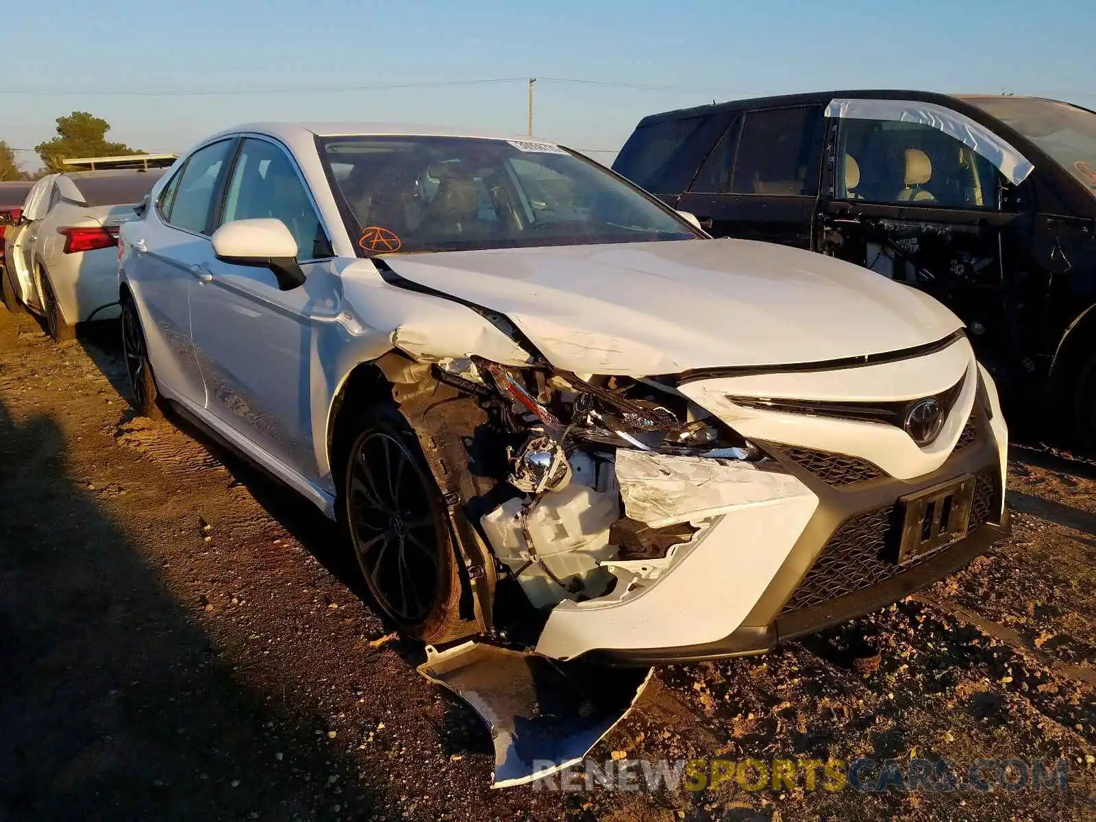 1 Photograph of a damaged car 4T1B11HK1KU209630 TOYOTA CAMRY 2019