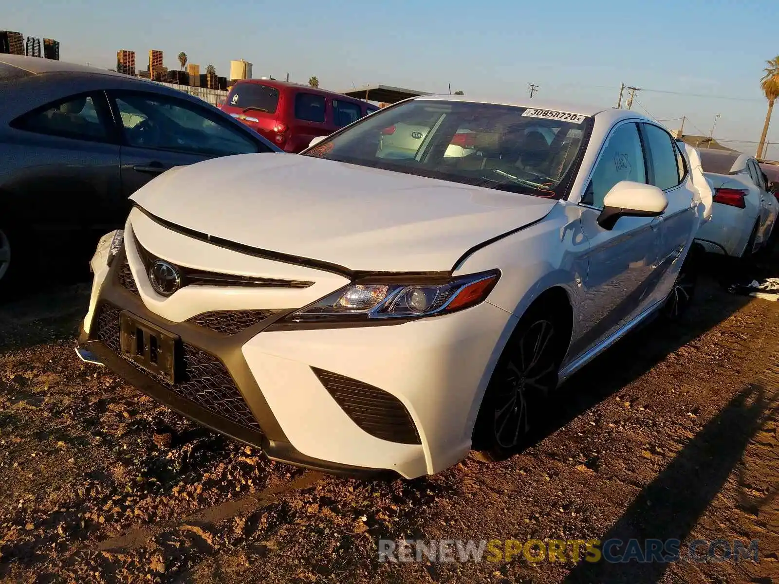 2 Photograph of a damaged car 4T1B11HK1KU209630 TOYOTA CAMRY 2019