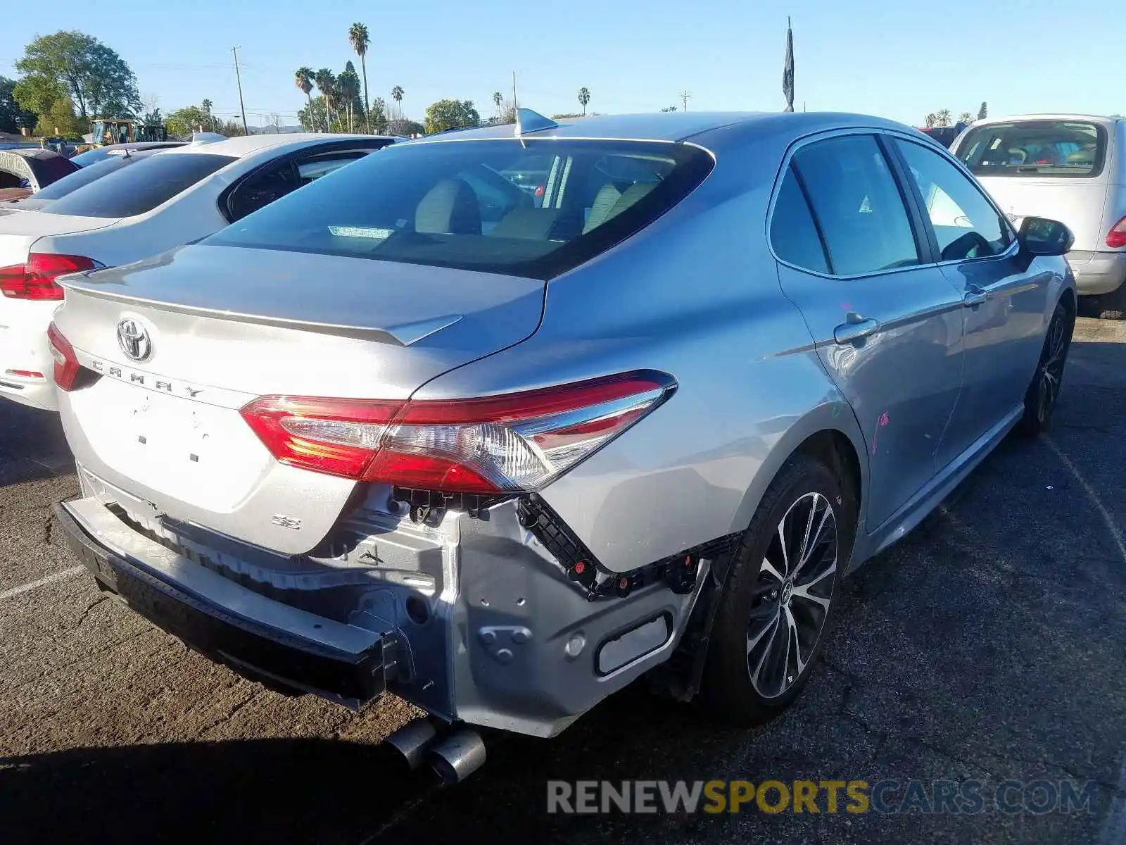 4 Photograph of a damaged car 4T1B11HK1KU210311 TOYOTA CAMRY 2019