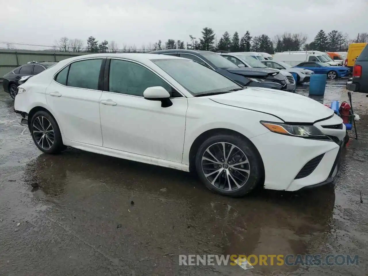 4 Photograph of a damaged car 4T1B11HK1KU210325 TOYOTA CAMRY 2019