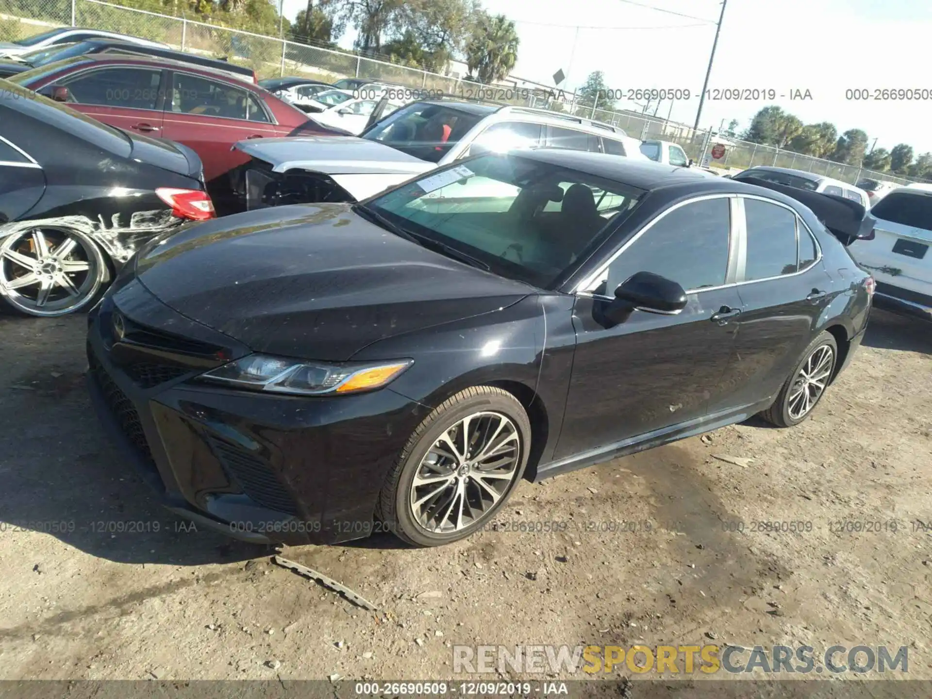 2 Photograph of a damaged car 4T1B11HK1KU211149 TOYOTA CAMRY 2019