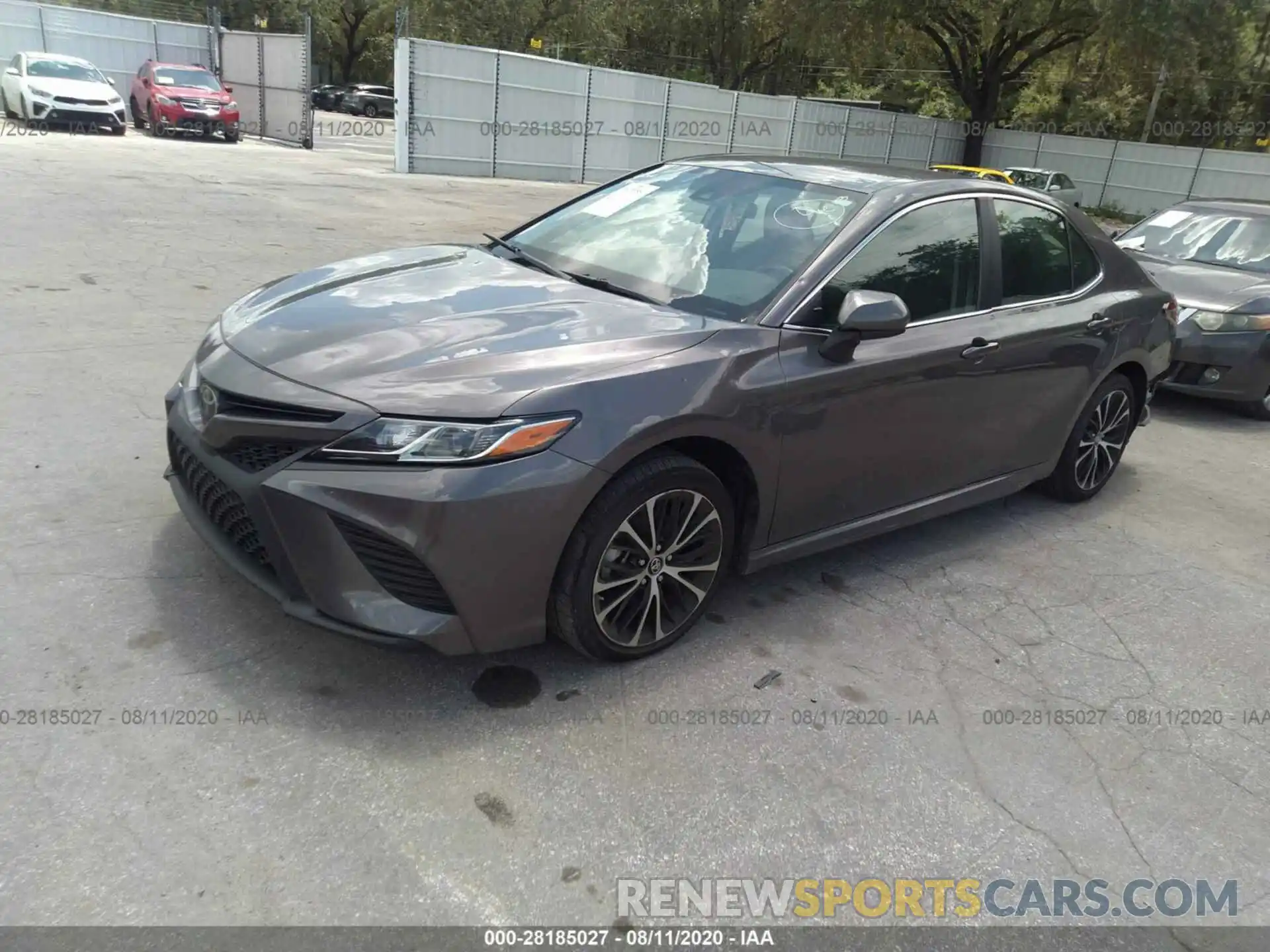 2 Photograph of a damaged car 4T1B11HK1KU212303 TOYOTA CAMRY 2019