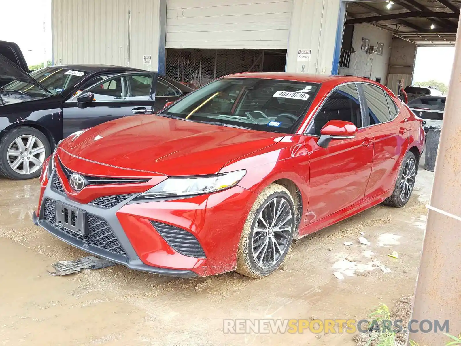 2 Photograph of a damaged car 4T1B11HK1KU212379 TOYOTA CAMRY 2019