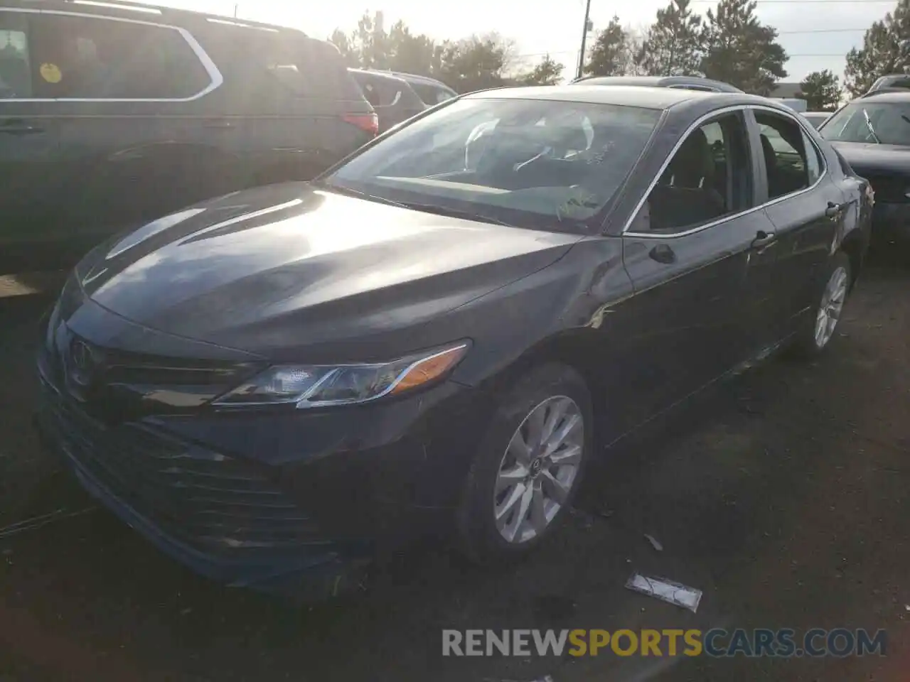 2 Photograph of a damaged car 4T1B11HK1KU213564 TOYOTA CAMRY 2019