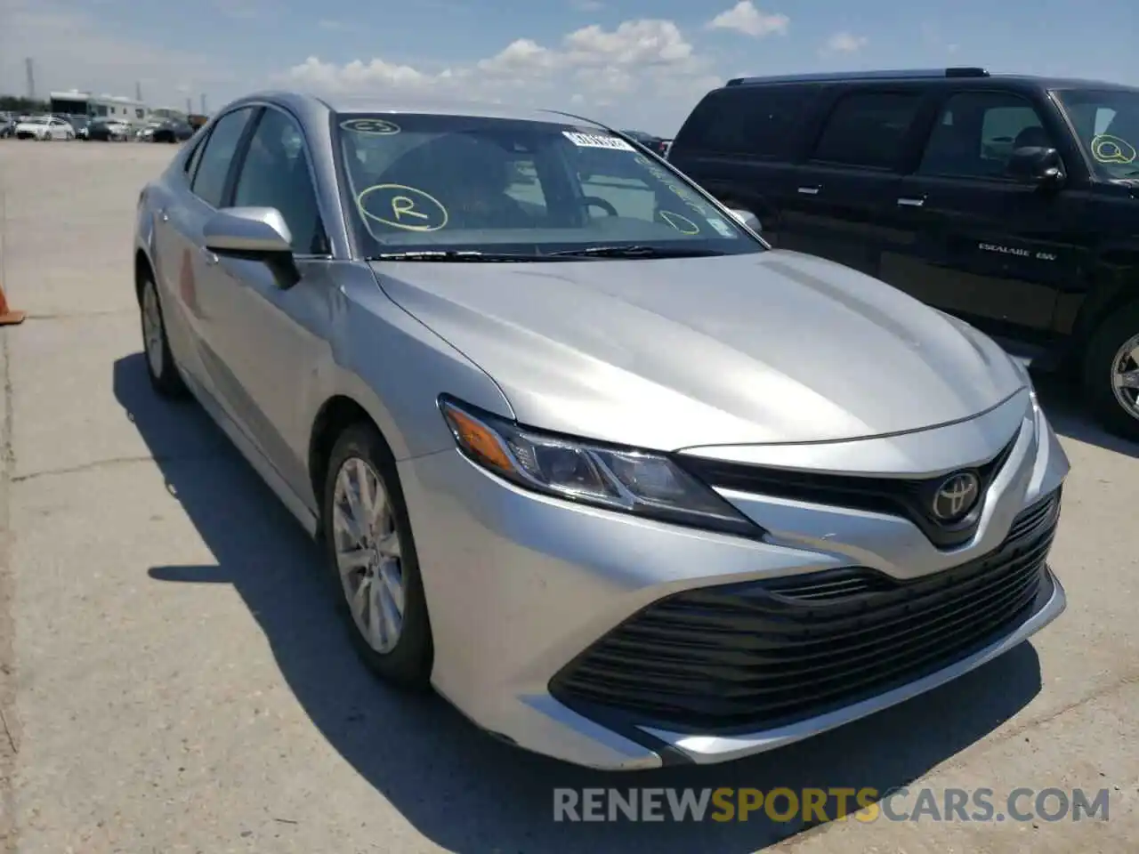 1 Photograph of a damaged car 4T1B11HK1KU213581 TOYOTA CAMRY 2019